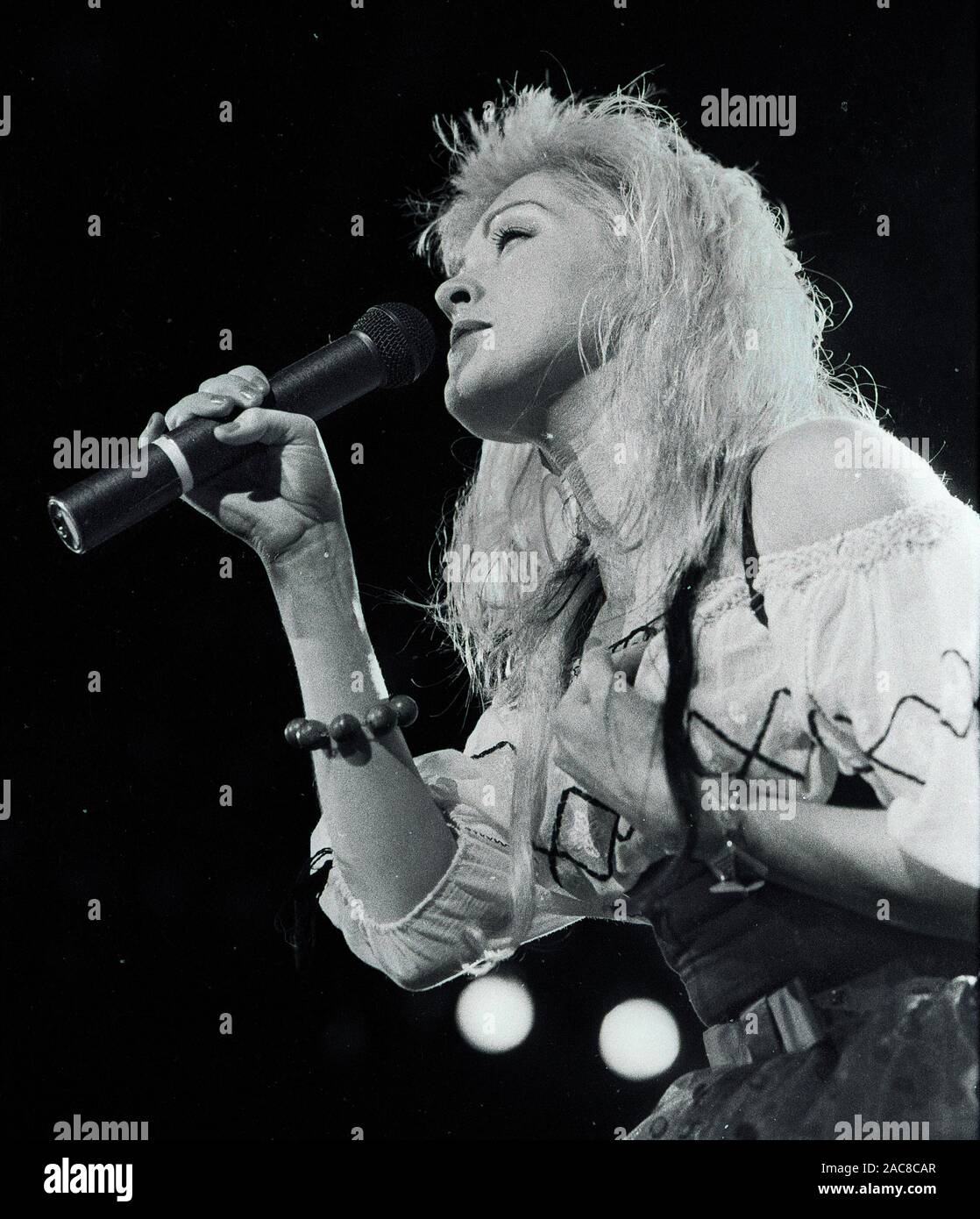 Cyndi Lauper singing in the  “True Colors” tour concert at the Worcester Centruim in worcester Ma USA 1980’s photo by bill belknap Stock Photo