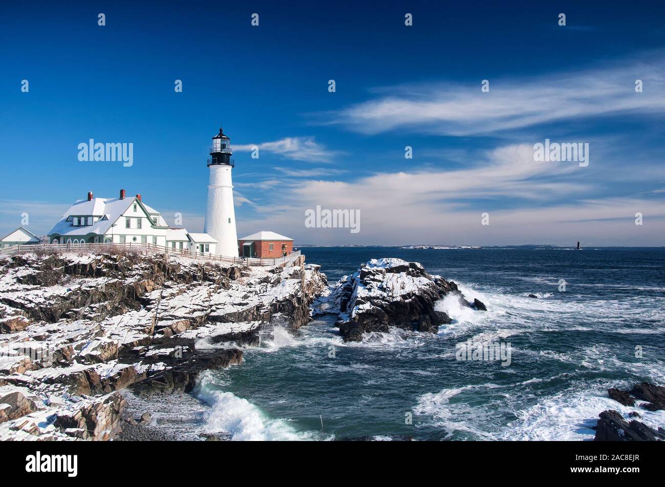 the iconic landmark Portland Headlight after a winter storm in Portland