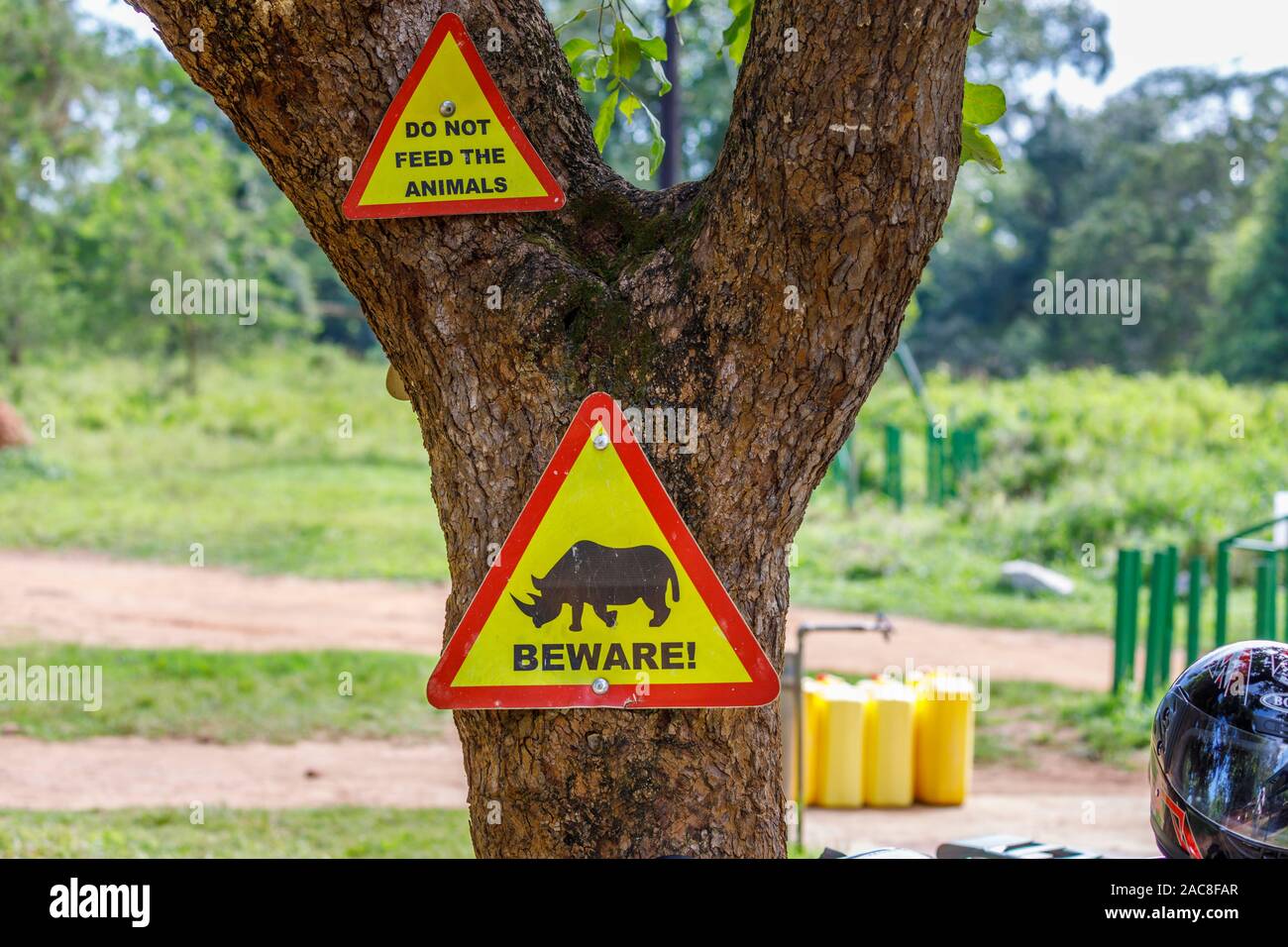 Rhino sign at Ziwa Rhino Sanctuary, Nakasongola District, Central Uganda, a sanctuary for reintroduced Southern white rhinoceros (Ceratotherium simum) Stock Photo