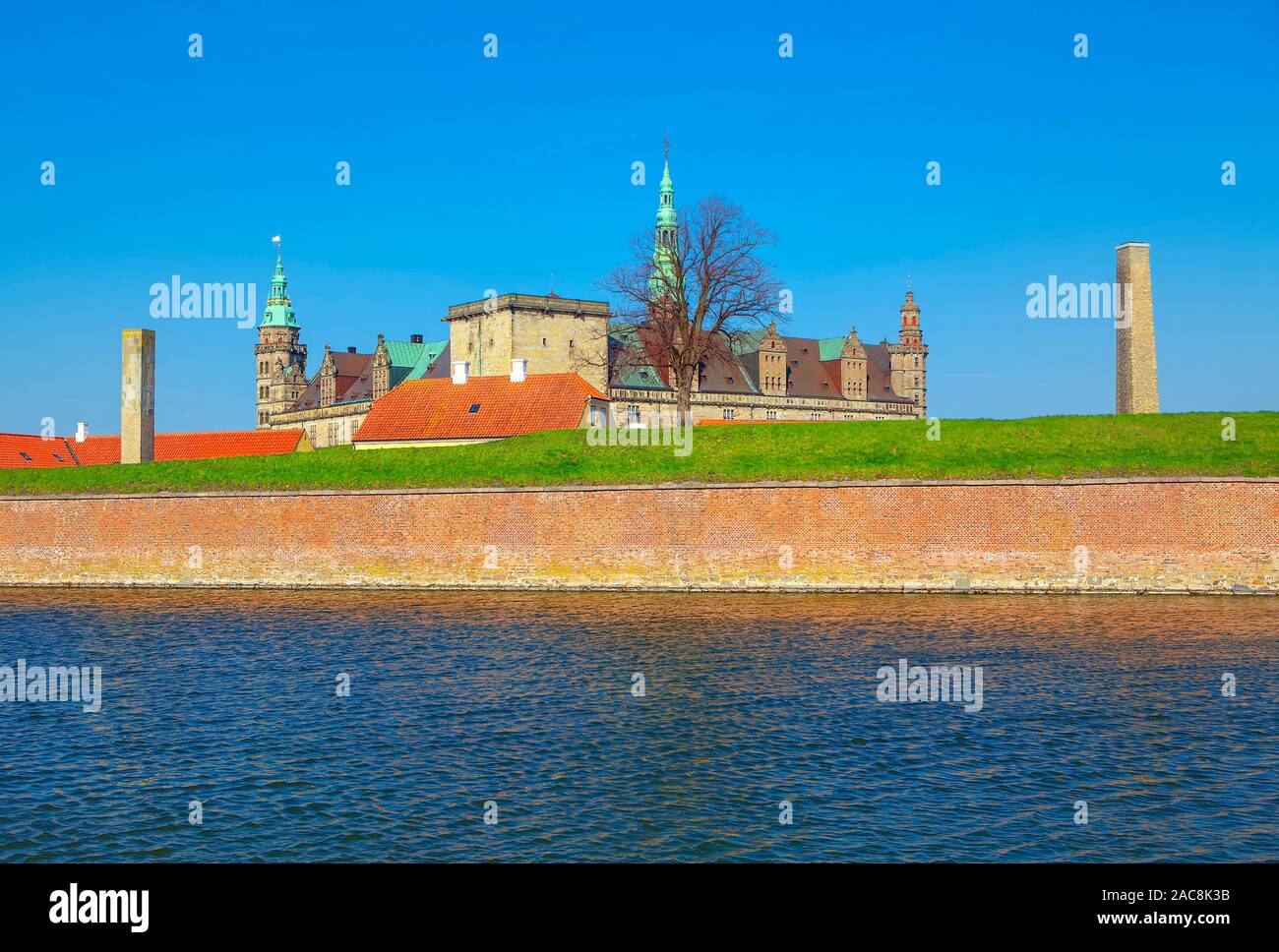Kronborg castle and water canal in Helsingor , Denmark Stock Photo