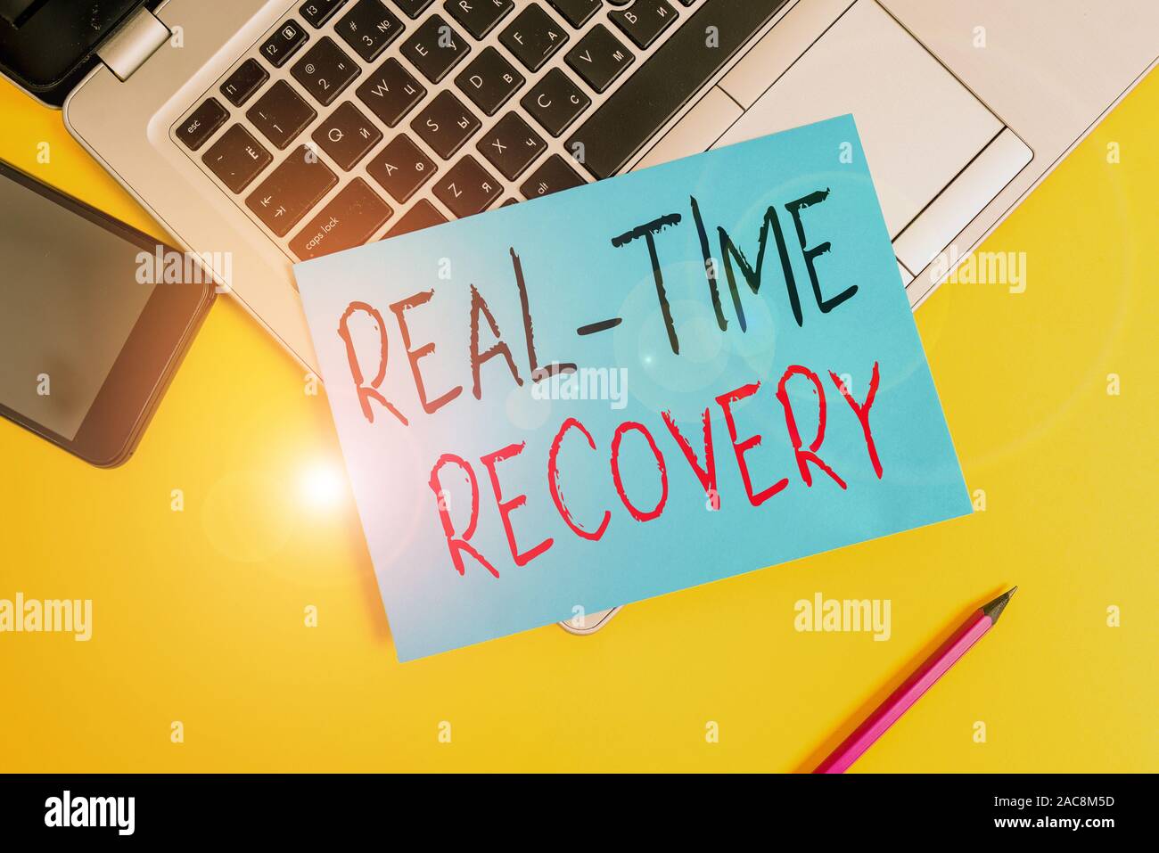 Writing note showing Real Time Recovery. Business concept for maximum ...