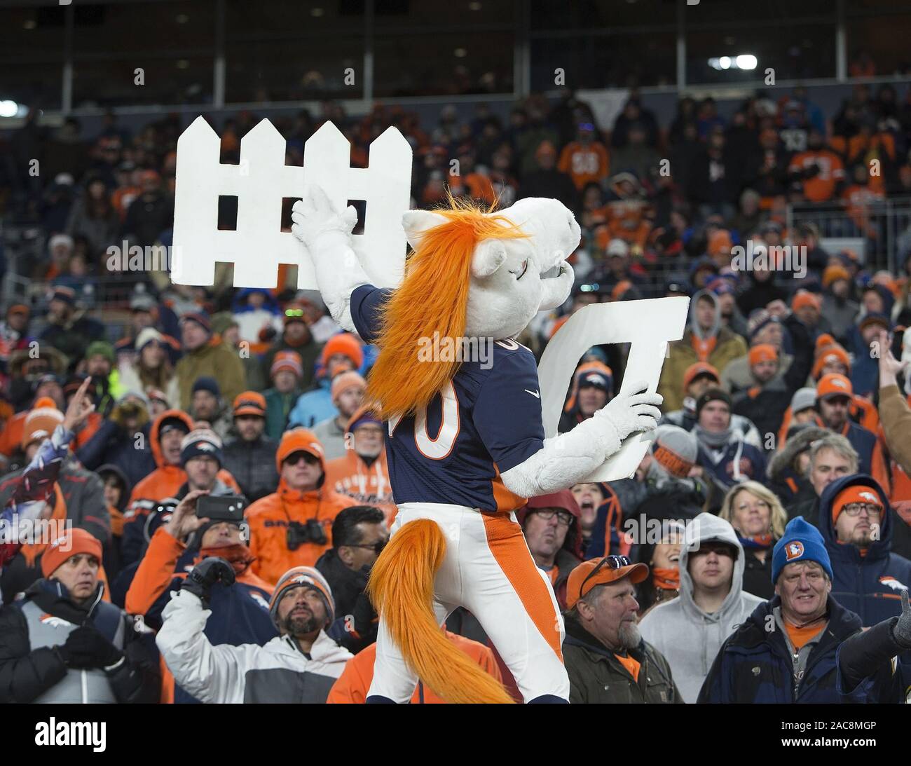Denver, Colorado, USA. 1st Dec, 2019. Broncos Mascot MILES gets the crowd yelling for the Broncos defense during the 2nd. Half Sunday afternoon at Empower Field At Mile High in Denver CO. Broncos beat the Chargers 23-20. Credit: Hector Acevedo/ZUMA Wire/Alamy Live News Stock Photo