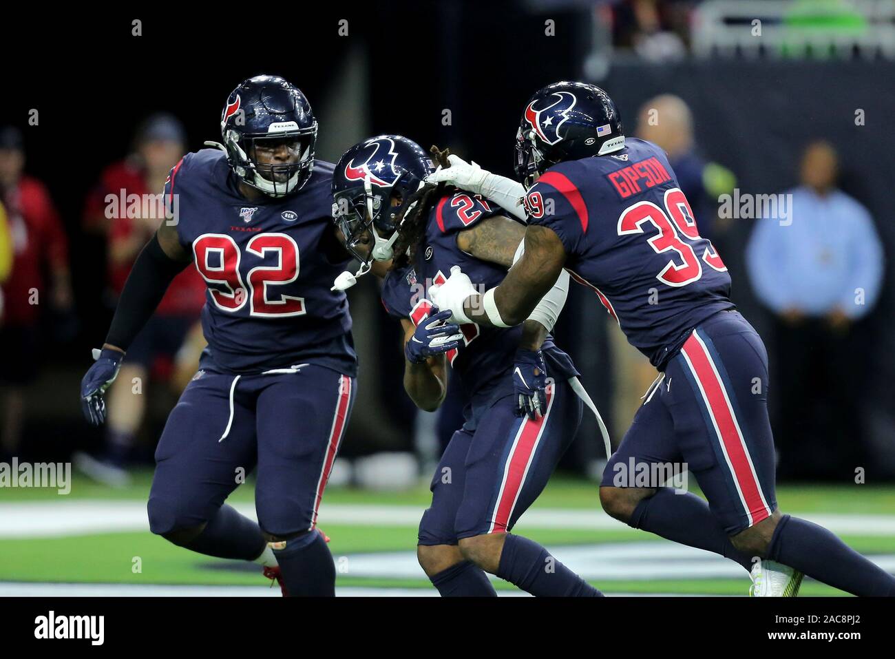 Houston, Texas, USA. 1st Dec, 2019. Houston Texans cornerback Bradley Roby (21) is congratulated by teammates after an interception during the first quarter of the NFL regular season game between the Houston Texans and the New England Patriots at NRG Stadium in Houston, TX on December 1, 2019. Credit: Erik Williams/ZUMA Wire/Alamy Live News Stock Photo