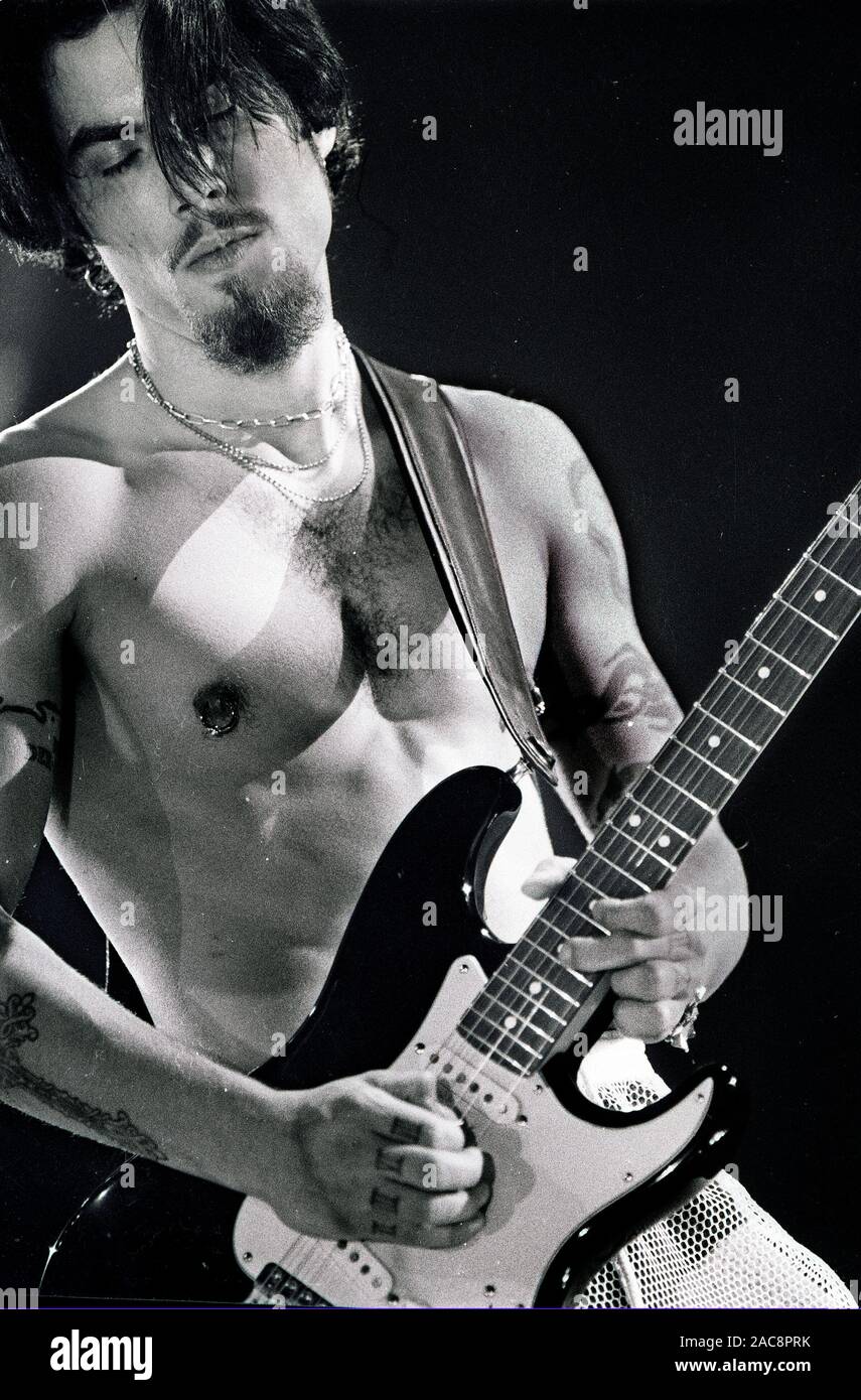 Red Hot Chilli Peppers Dave Navarro playing in concert at Great Woods in Mansfield Ma USA photo by bill belknap Stock Photo