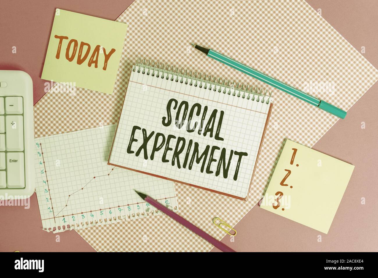Text sign showing Social Experiment. Business photo showcasing the research project conducted with huanalysis subjects Writing equipments and computer Stock Photo