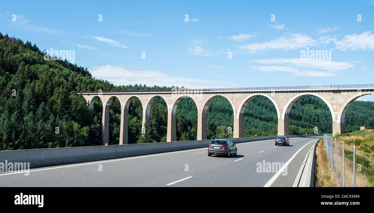Highway and Arched bridge, France Stock Photo