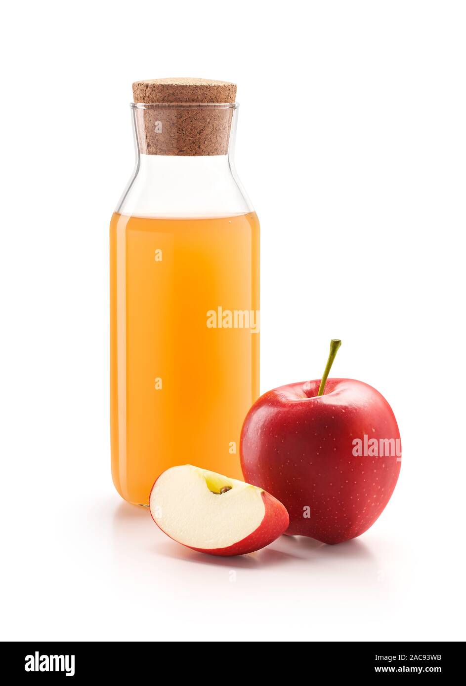 Bottle of apple cider vinegar with fresh red apples isolated on white ...