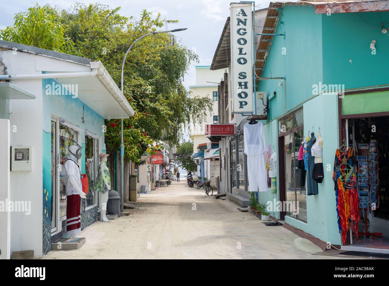 Maafushi Island, Maldives - November 26, 2019: Souviner shops and gift stores for tourists line the streets of Maafushi in the Maldives Stock Photo