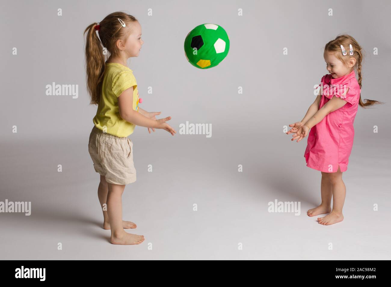 Throwing ball kids hi-res stock photography and images - Alamy