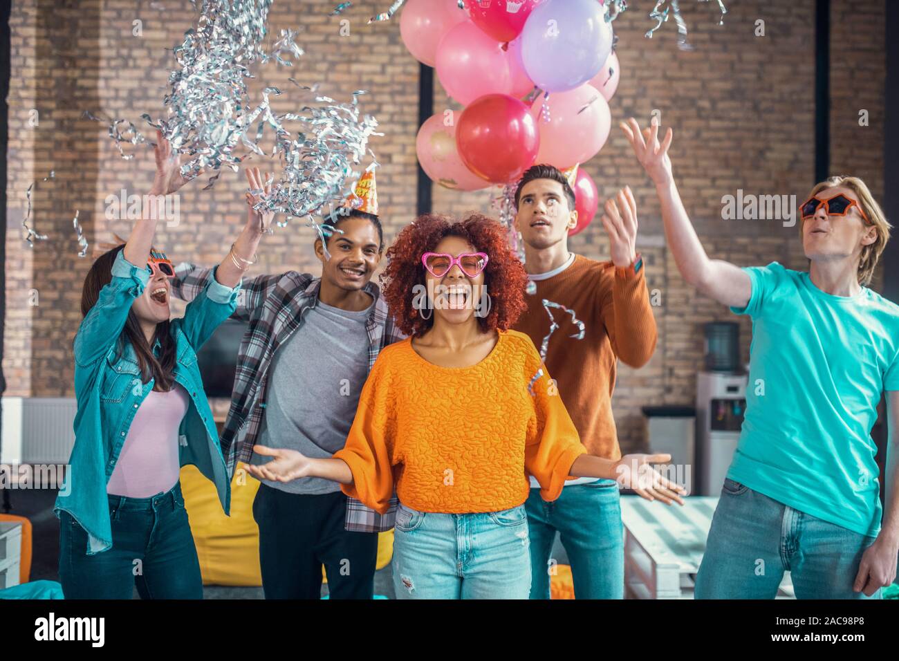 Mulatto birthday girl. Curly mulatto birthday girl feeling extremely