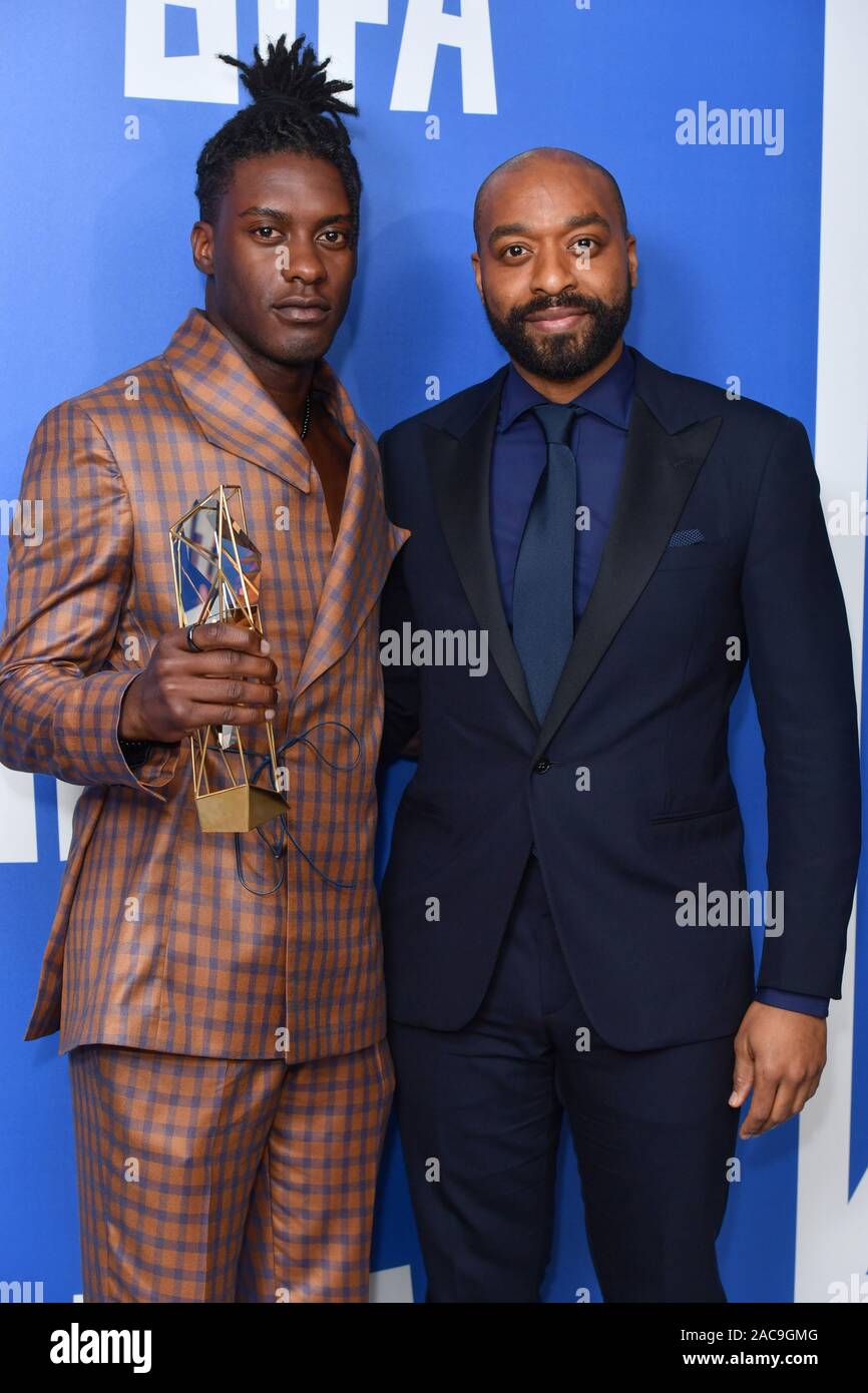 Sam Adewunmi and Chiwetel Ejiofor in the press room during the 22nd British Independent Film Awards held at Old Billingsgate, London. Stock Photo