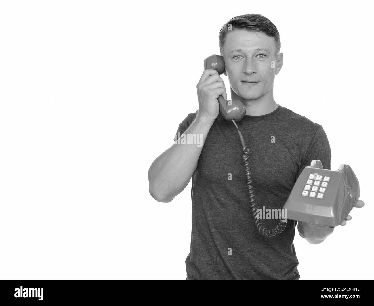 Man Using Red Telephone Handsome old man studio hi-res stock photography and images - Alamy