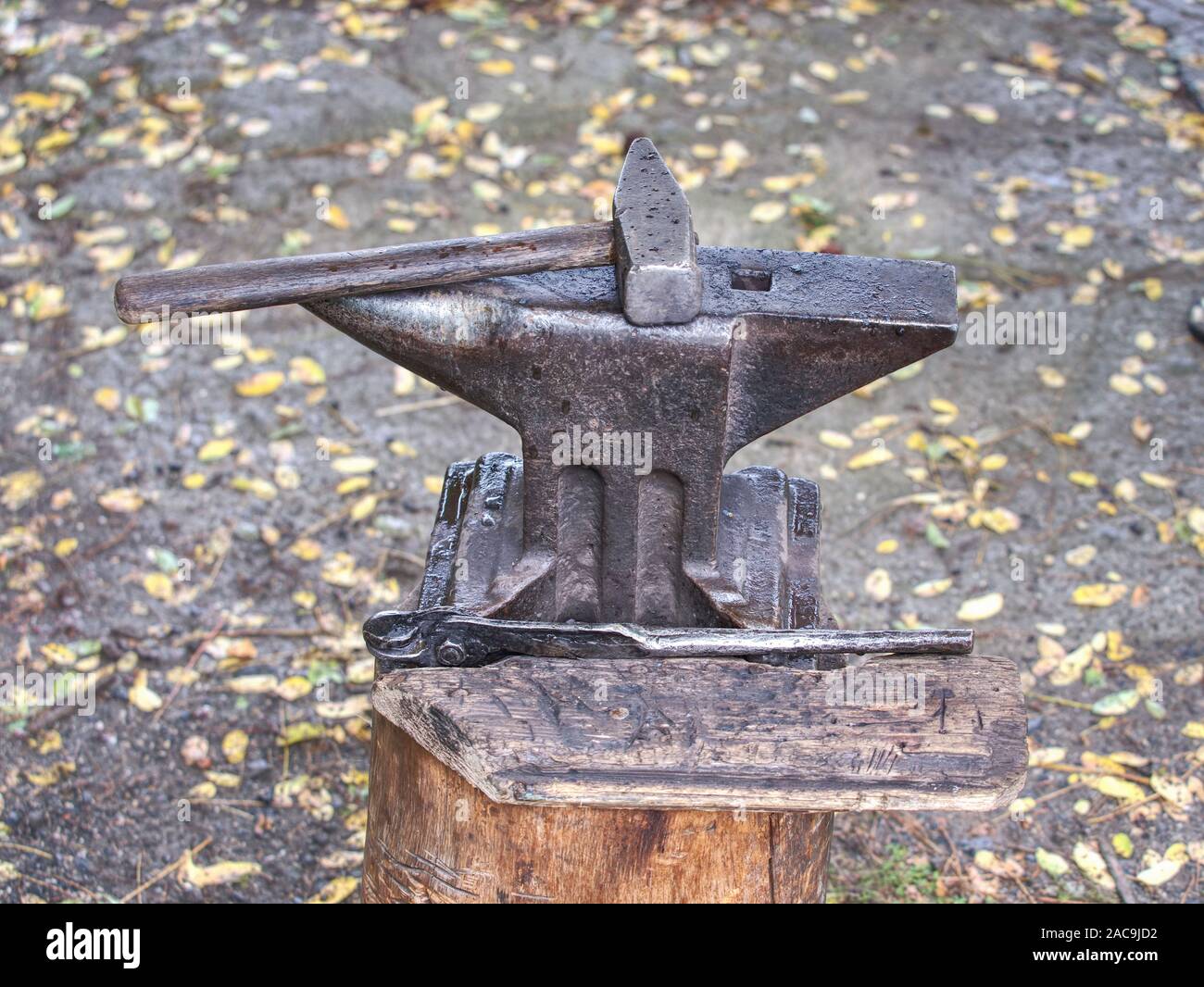Hammer and pliers for place on steel anvil, big sledgehammer