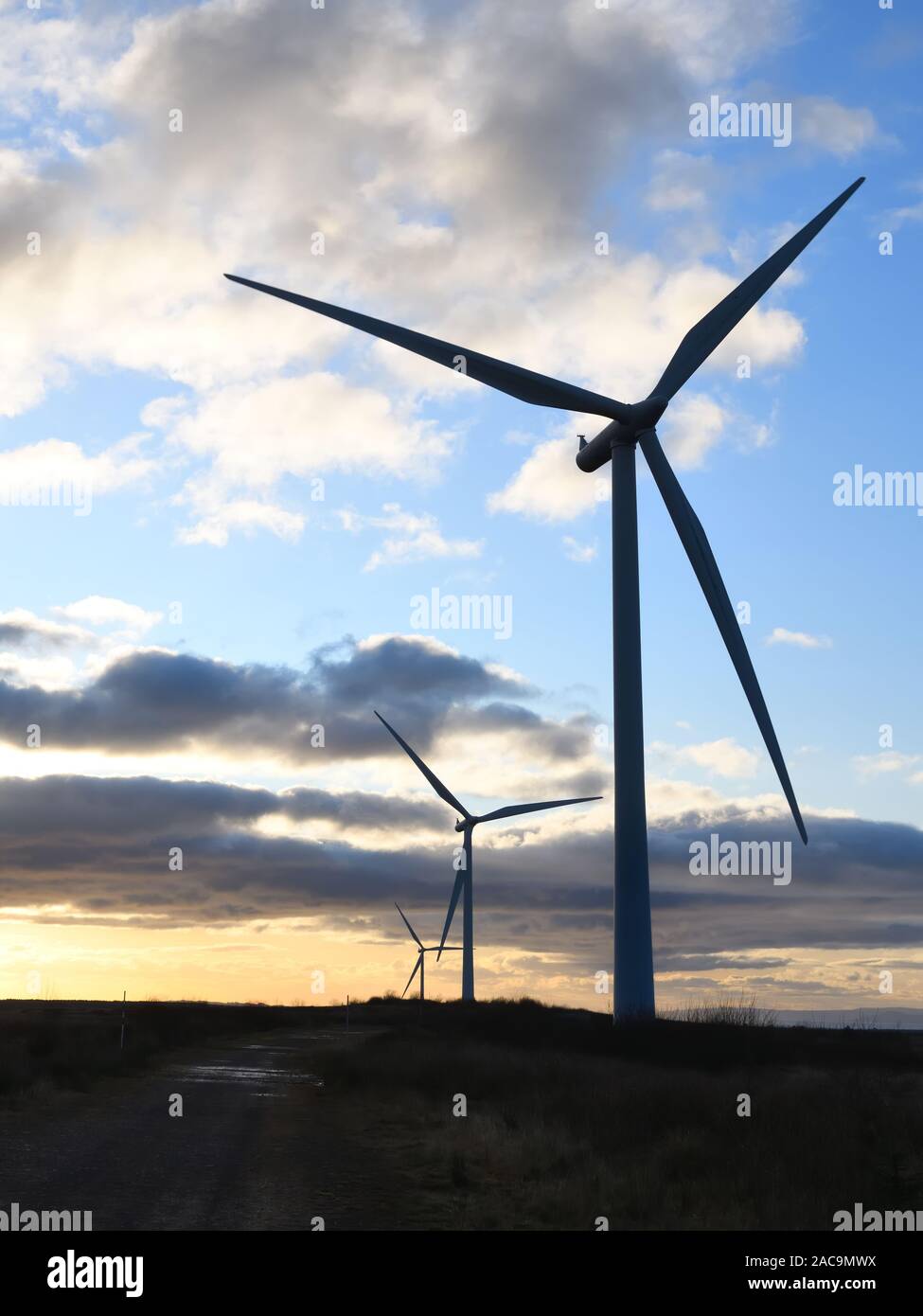 Scottish Power turbines at sunset at Whitelee windfarm on the Eaglesham Moor which is the largest onshore windfarm in Britain, in Scotland, UK, Europe Stock Photo
