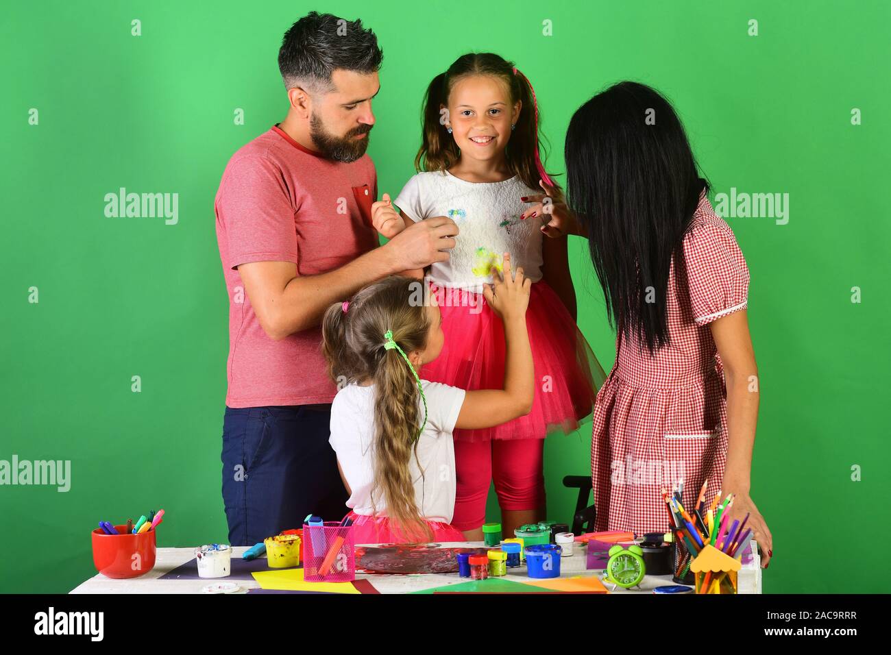 Parents And Children Paint With Gouache On Girls Top Girls Man