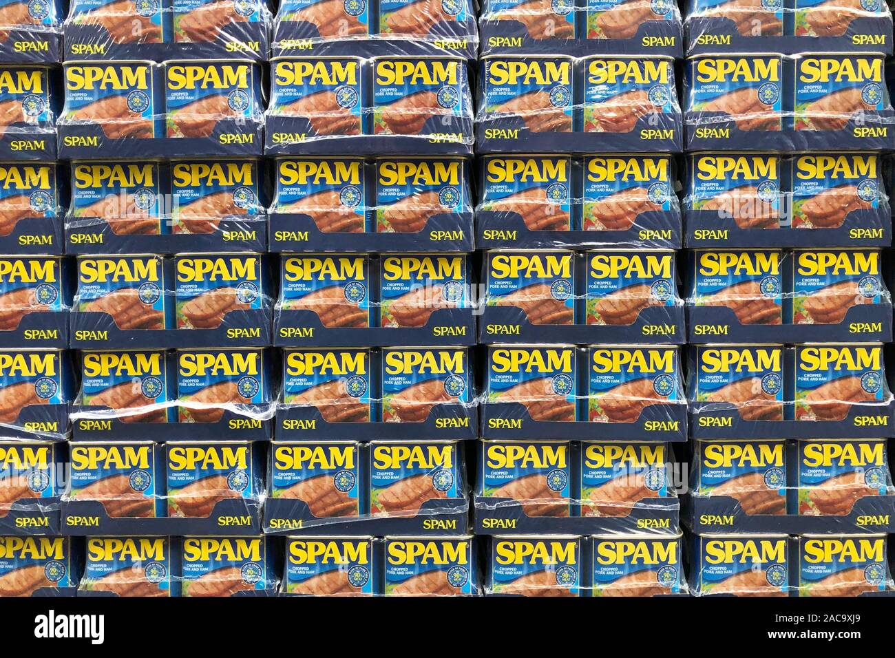 TINS OF SPAM PORK LUNCHEON MEAT, LONDON – JULY 06 2019, Tins or cans of Spam pork luncheon meat, concept photo for unwanted spam or junk email Stock Photo