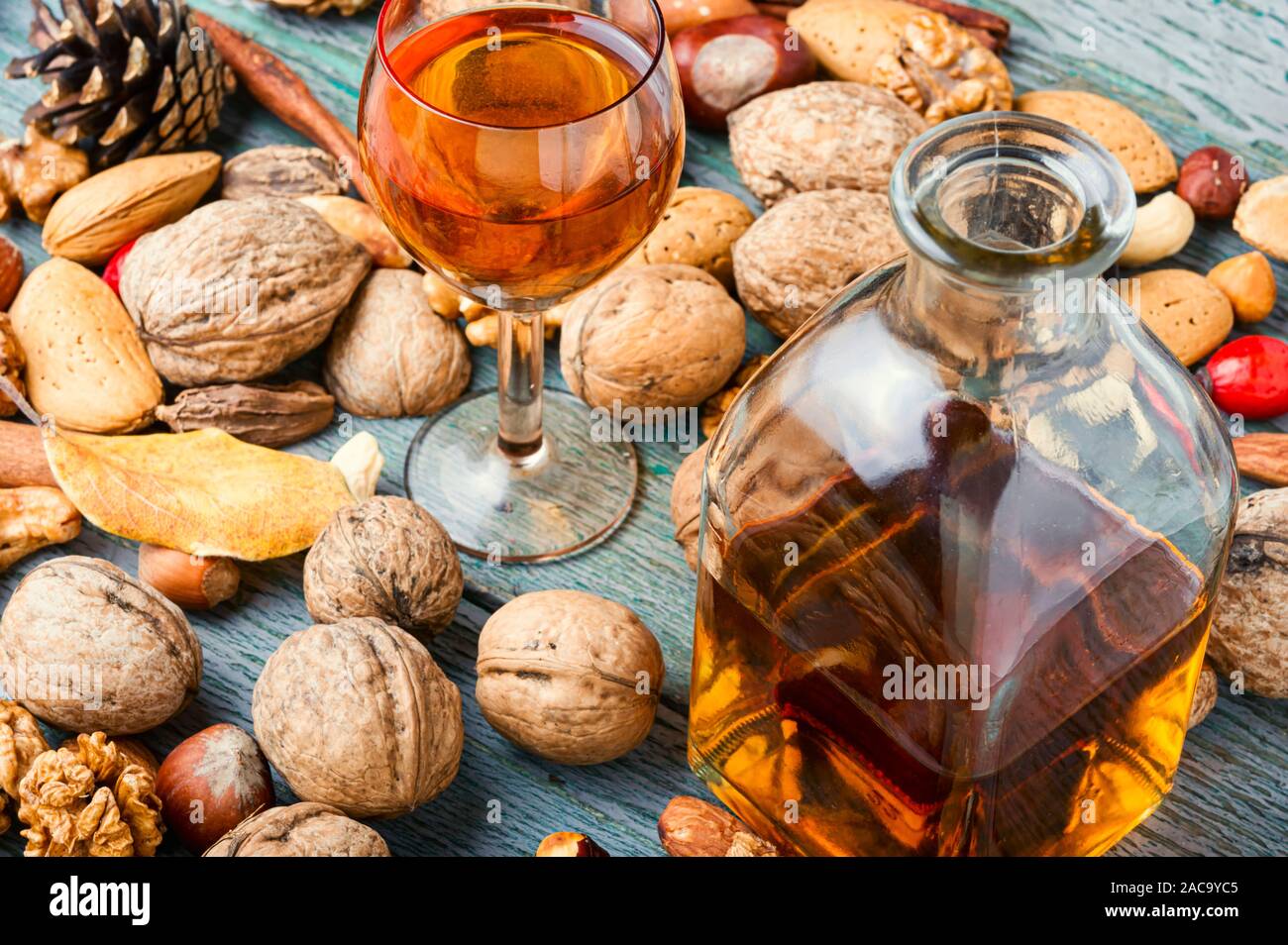 Fragrant nutty liquor tincture.Walnut liquor, sweet table alcoholic drink Stock Photo