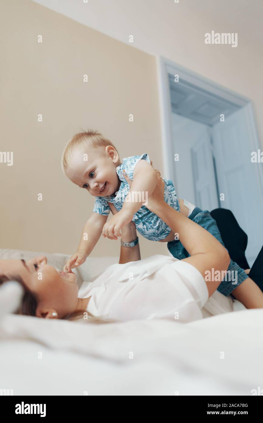 Young Mother Having Fun Laughing Playing Funny Active Games