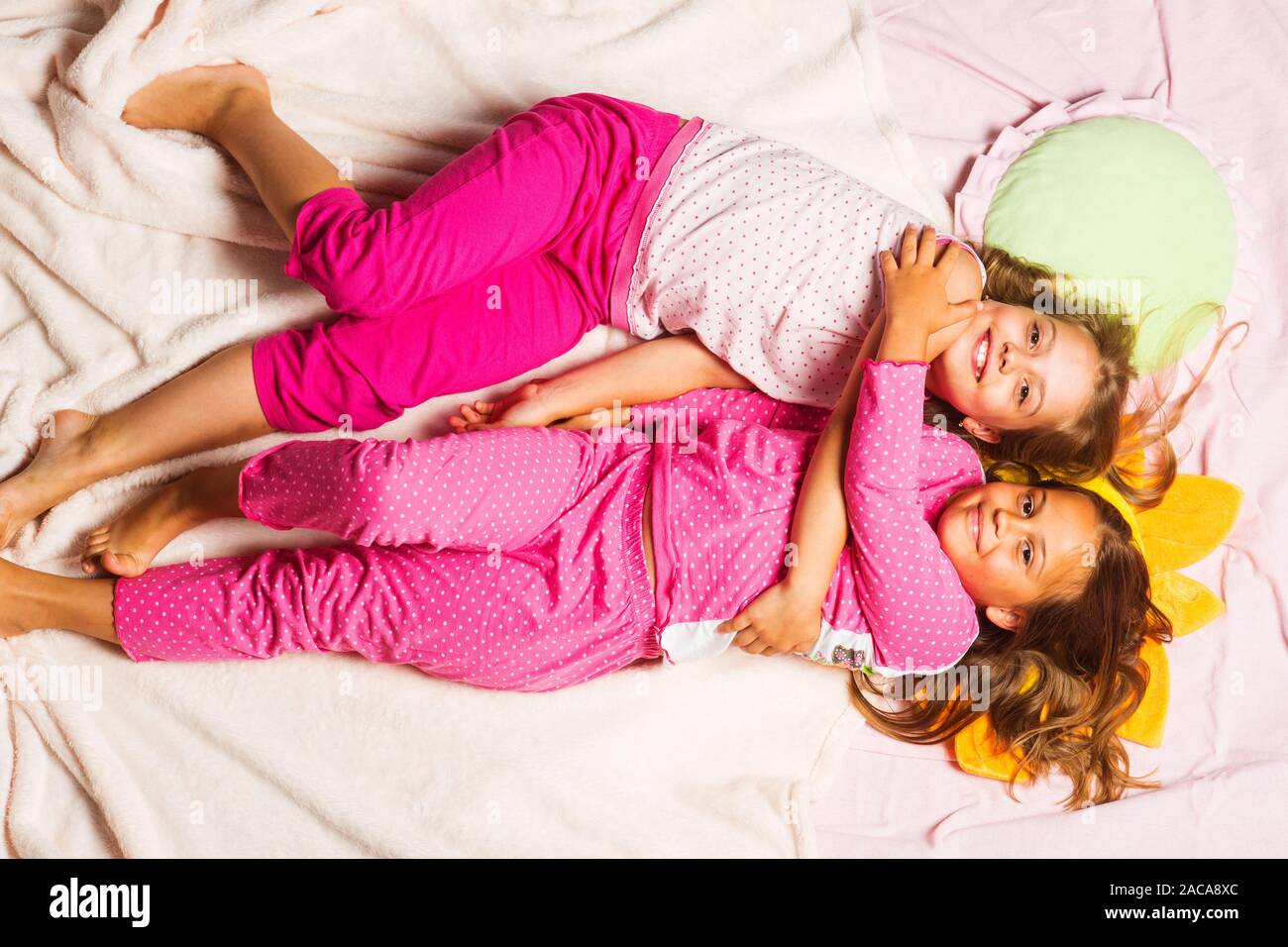 Schoolgirls Have Pajama Party With Funny Pillows Kids In Pink