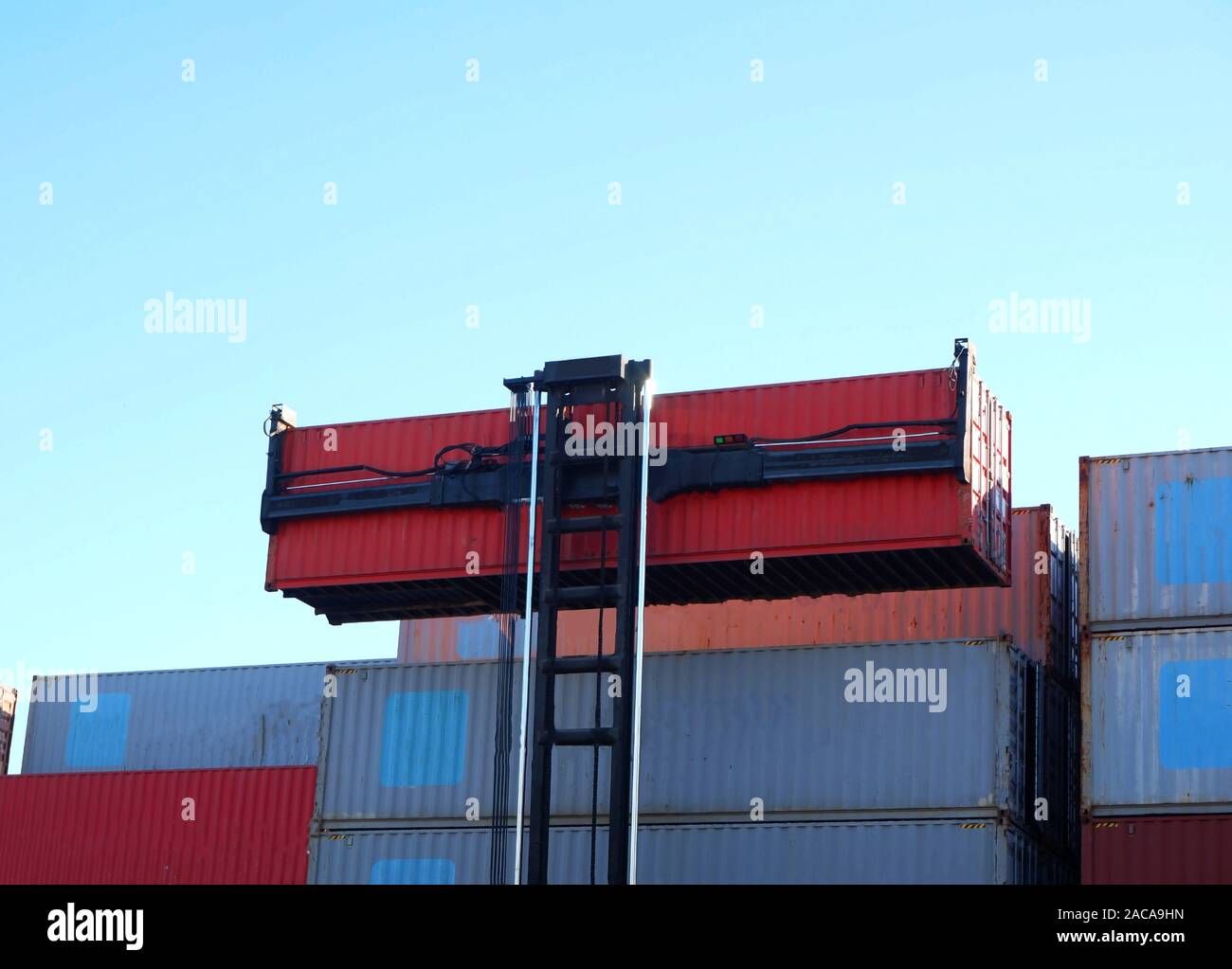 Industrial Container Stack Container in a container stack with an industrial crane. Import and ...