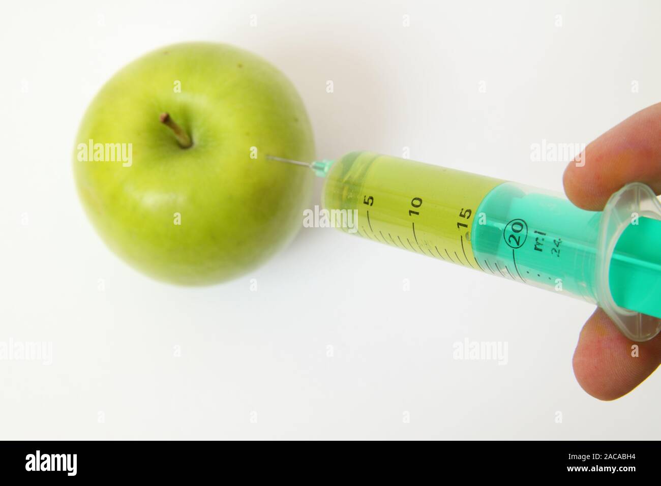 Injected apple Stock Photo