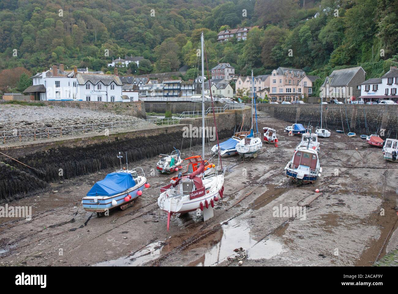 Boats moored in the harbour at low tide Lynmouth, Lynton near