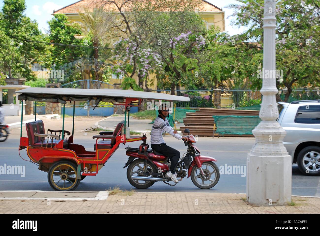 Motorcycle rickshaw riders in Phnom Penh, Cambodia, Asia Stock Photo