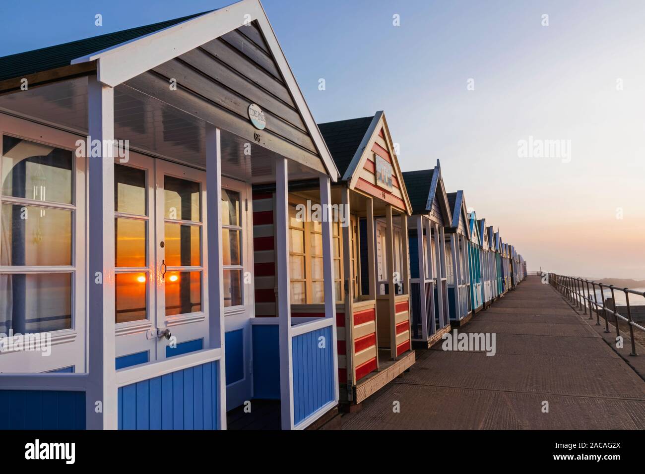 England, Suffolk, Southwold, Colourful Beach Huts Stock Photo