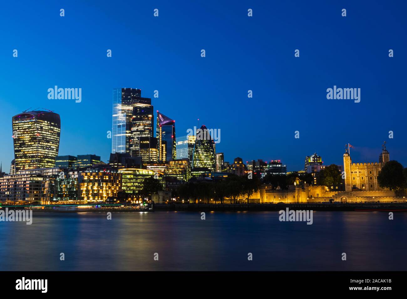 England, London, City Skyline View and River Thames at Night Stock Photo