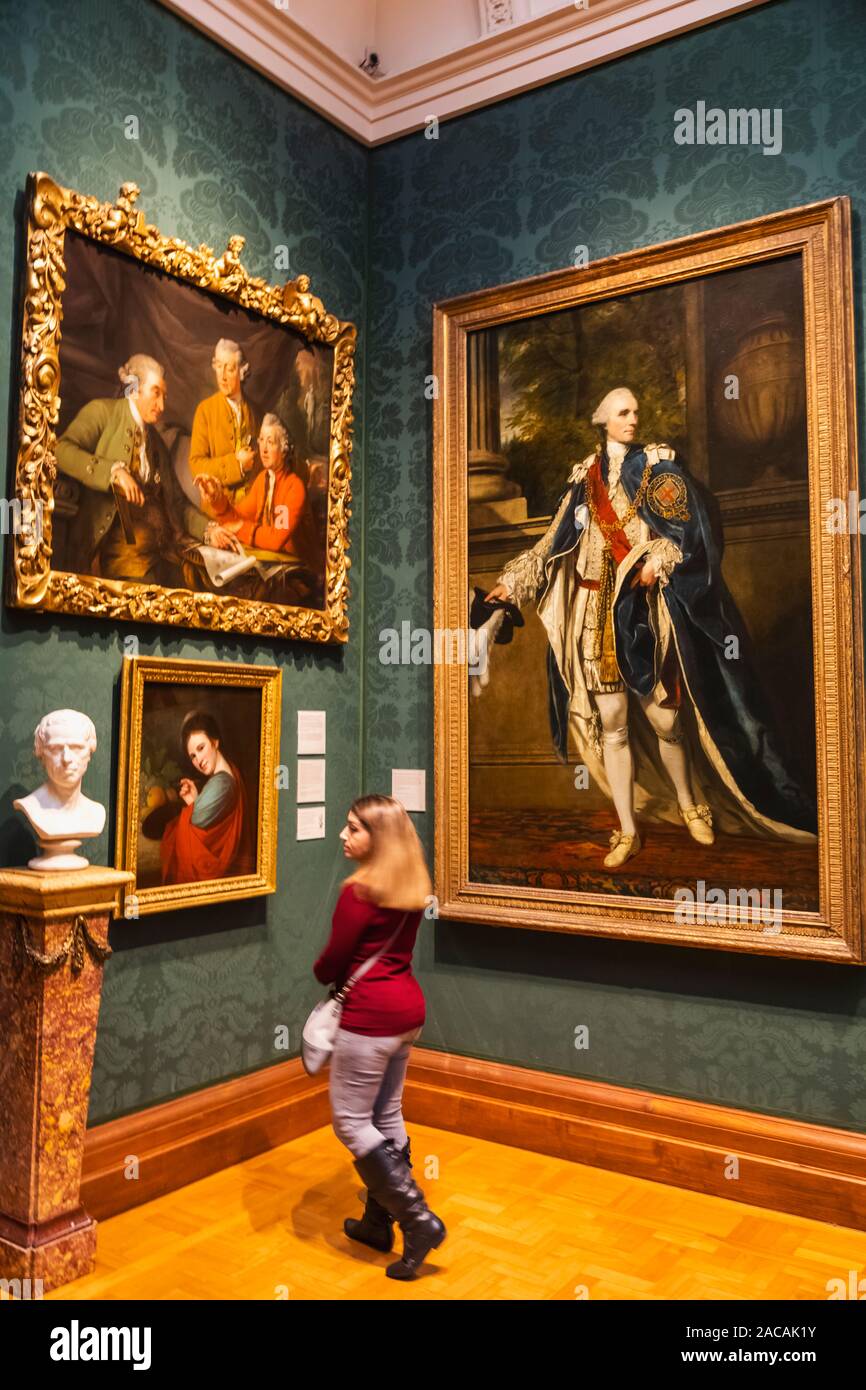 England, London, Trafalgar Square, The National Portrait Gallery, Female Visitor Looking at Artworks Stock Photo