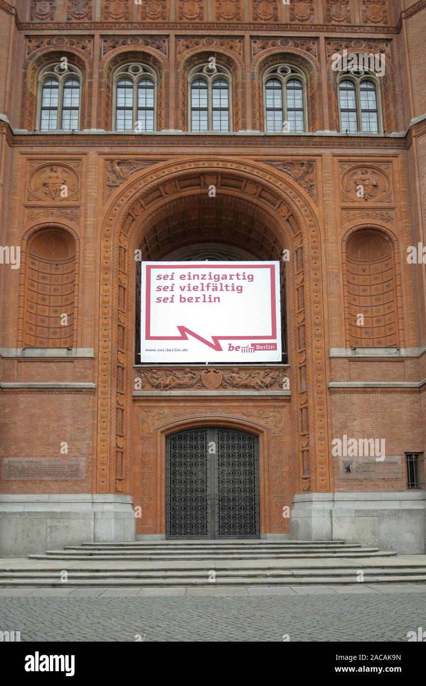 Main entrance of Berlin's red town hall with the new advertising slogan for Berlin Stock Photo