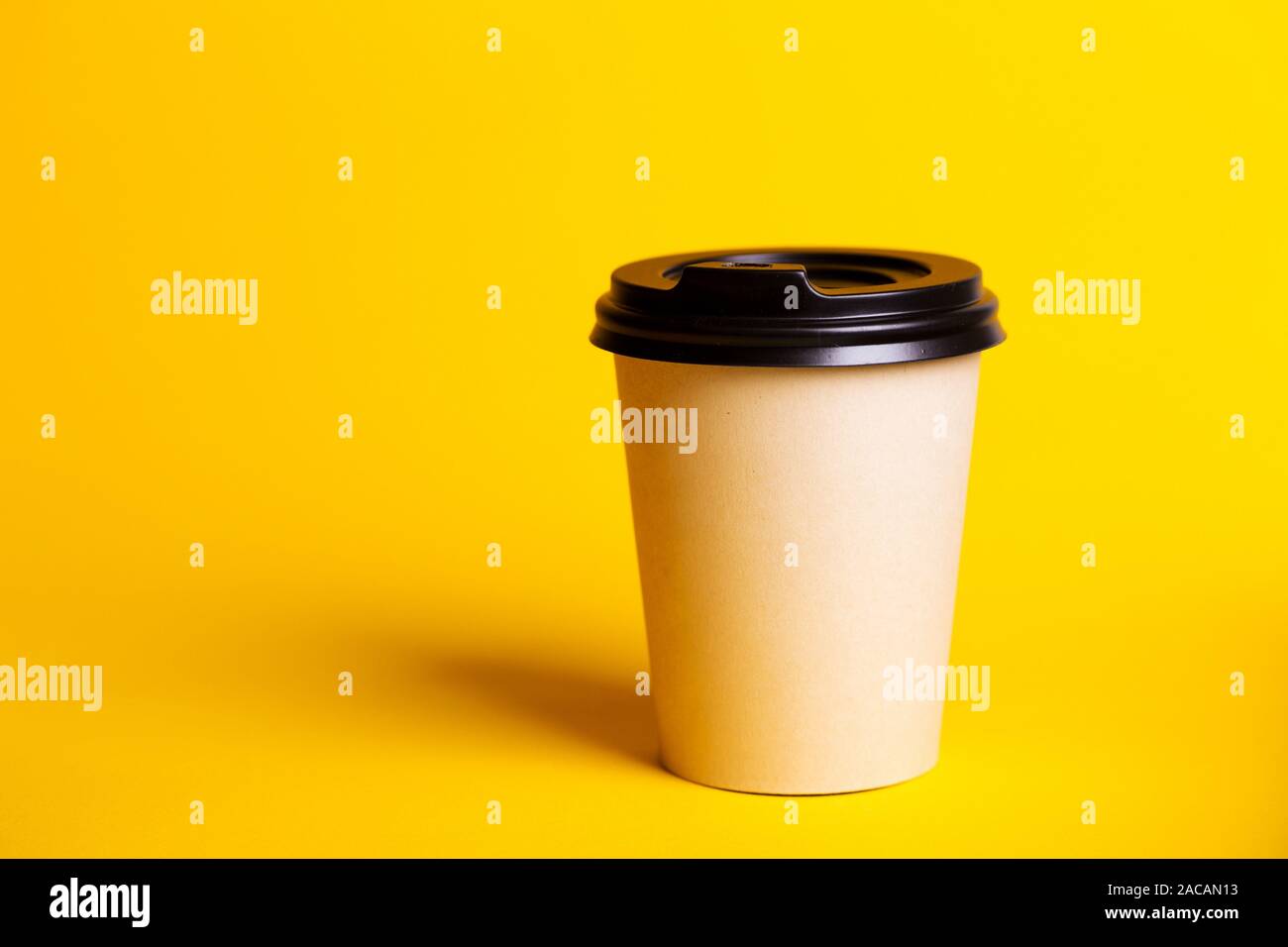 Download Coffee To Go Paper Cup With Coffee On A Yellow Background Stock Photo Alamy PSD Mockup Templates