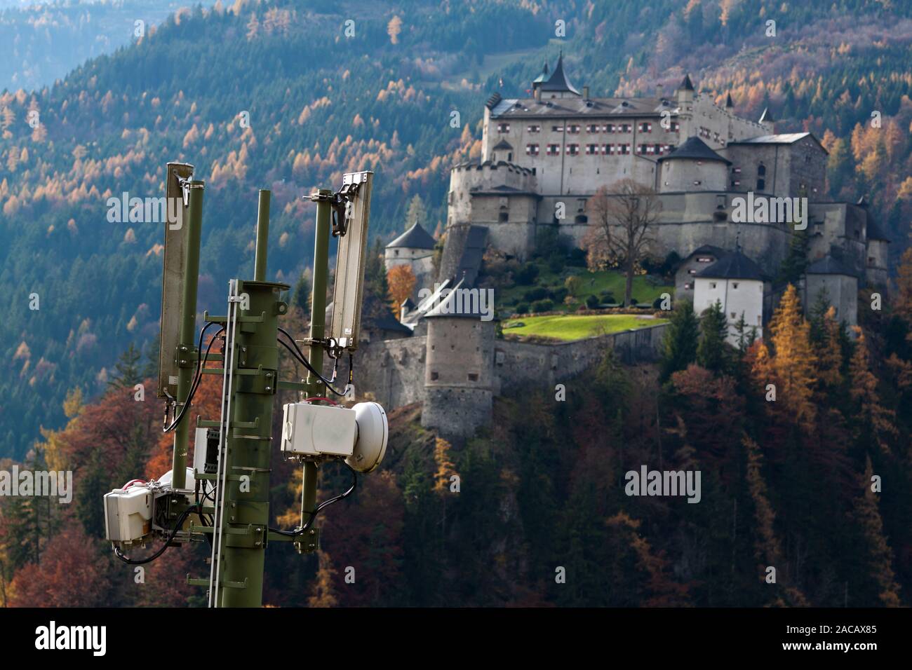 Mobile radio transmitter and Werfenweng Castle, Salzburg Stock Photo