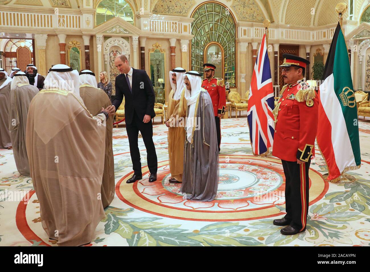 The Duke of Cambridge greets guests ahead of a luncheon with the Amir of Kuwait, His Highness Sheikh Sabah Al-Ahmad Al-Jaber Al-Sabah, at the Bayan Palace, Kuwait City, as part of his tour of Kuwait and Oman. Stock Photo