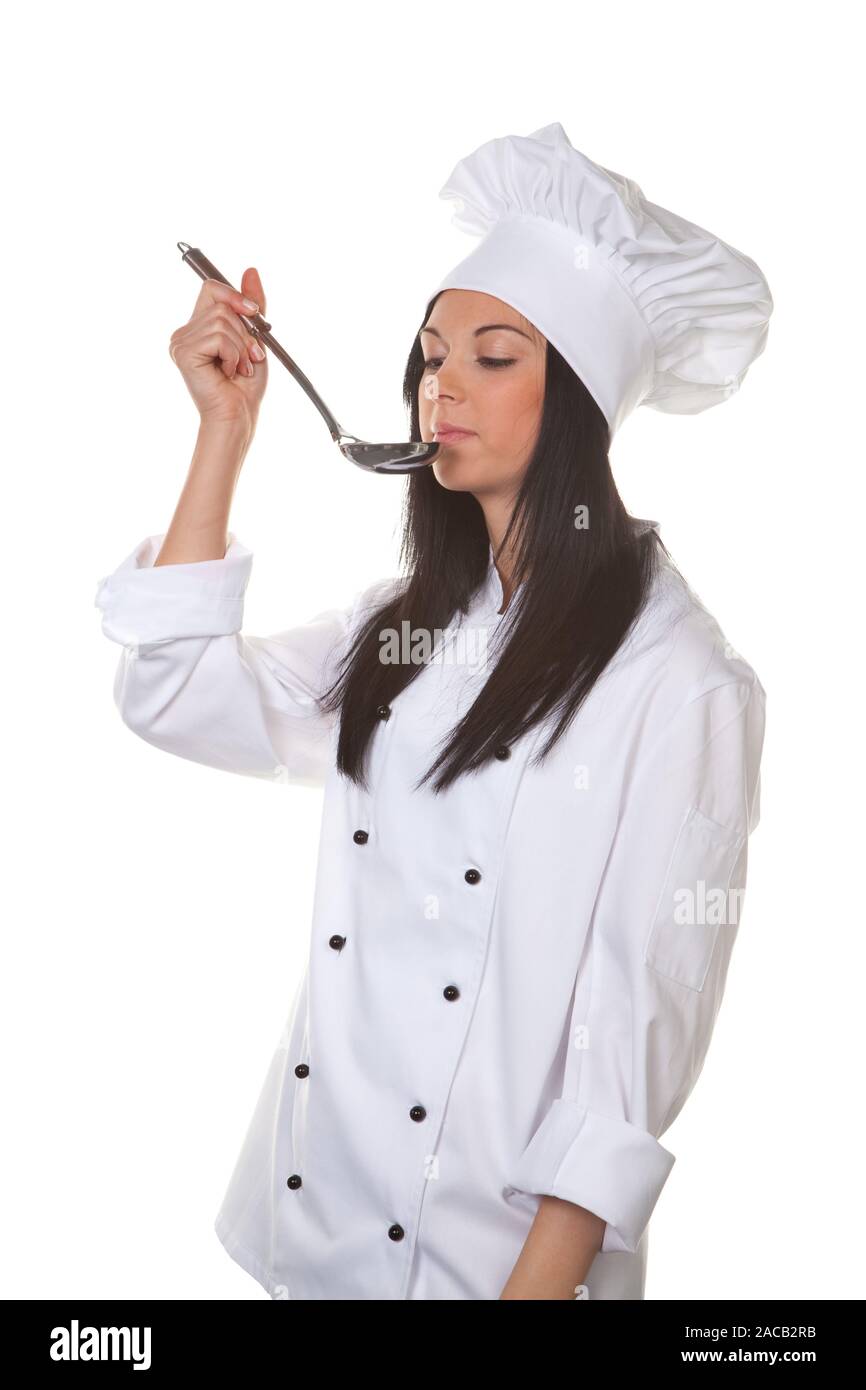 Young woman as cook Trainee Stock Photo
