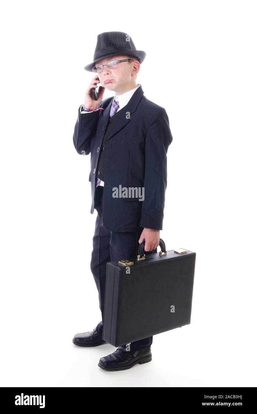 Young manager with suitcase on the phone Stock Photo