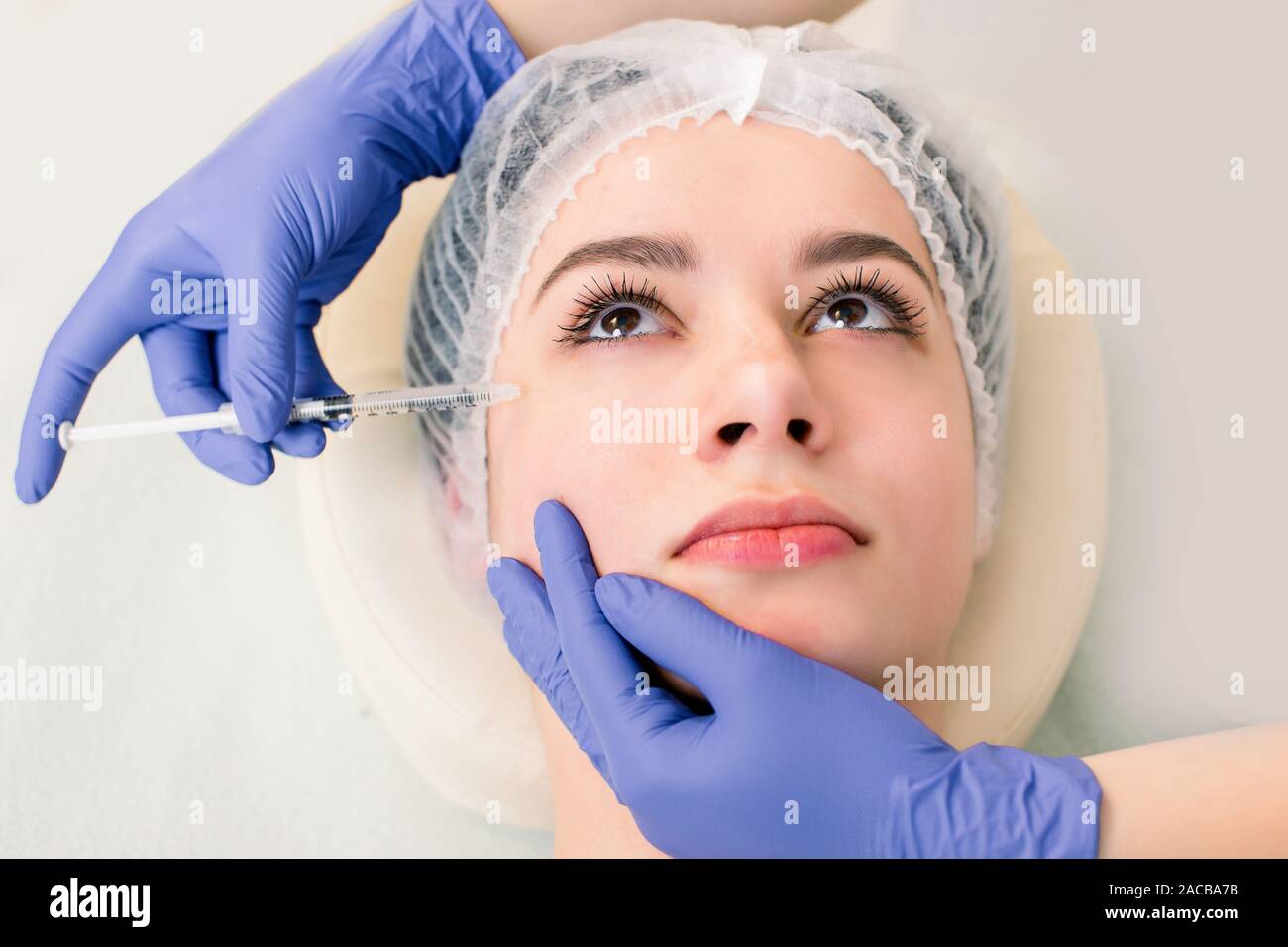Woman Gets Injection In Her Face Beauty Woman Giving Botox Injections Young Woman Gets Beauty 