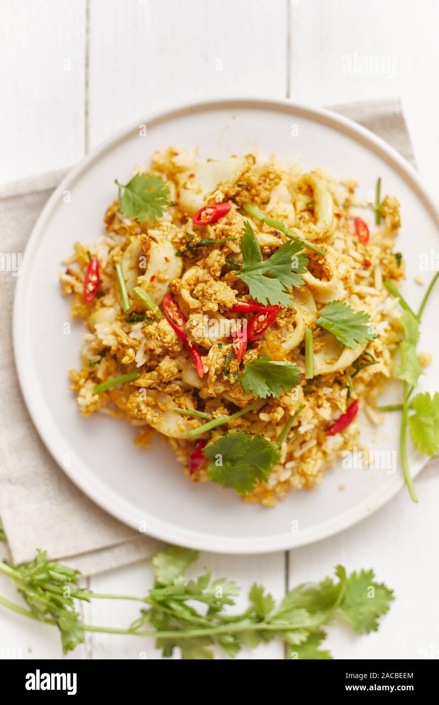 Stir fried squid with curry powder, Thai food Stock Photo - Alamy