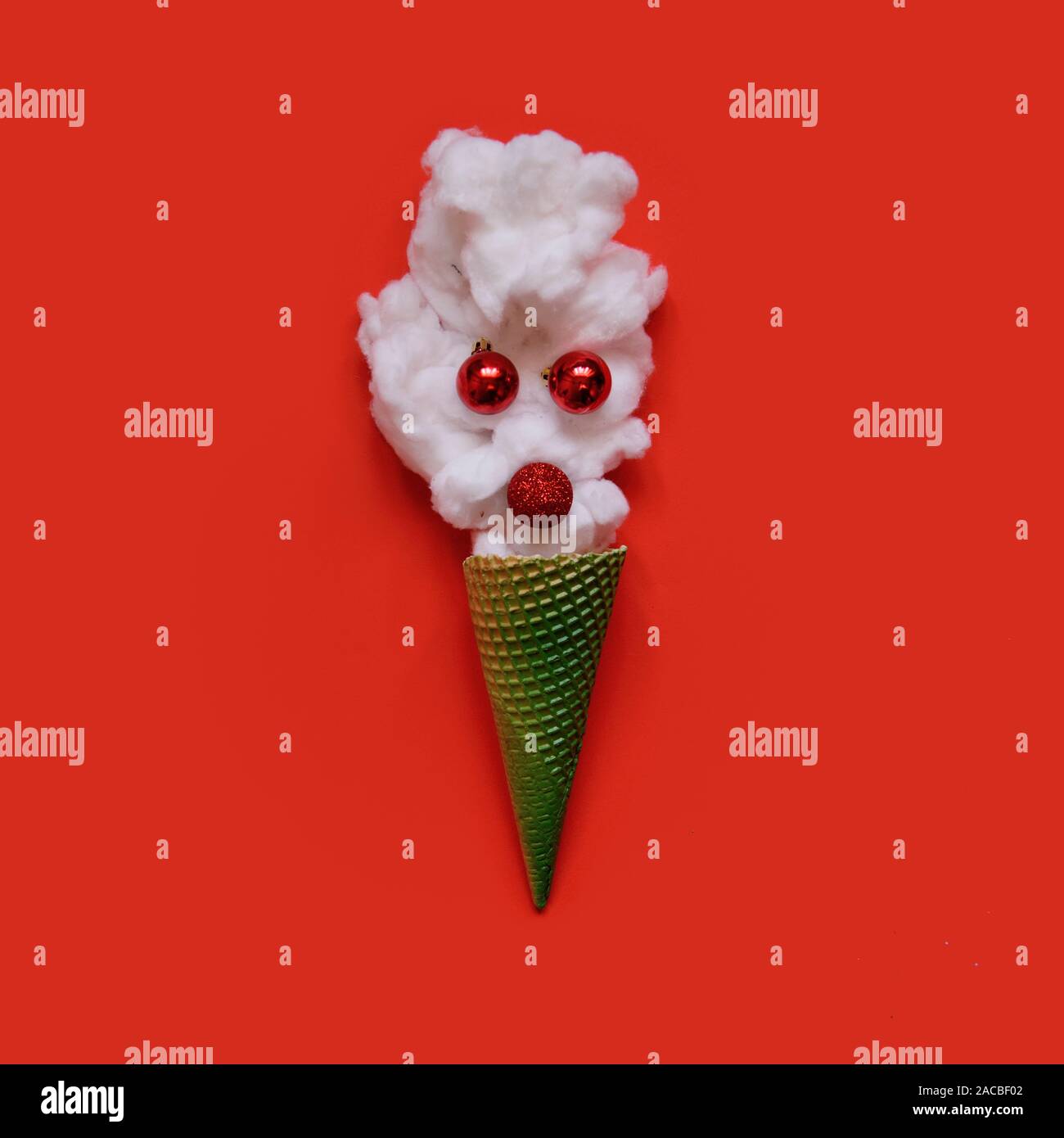Creative minimal christmas art. Symbol Christmas in ice cram cone. Stock Photo
