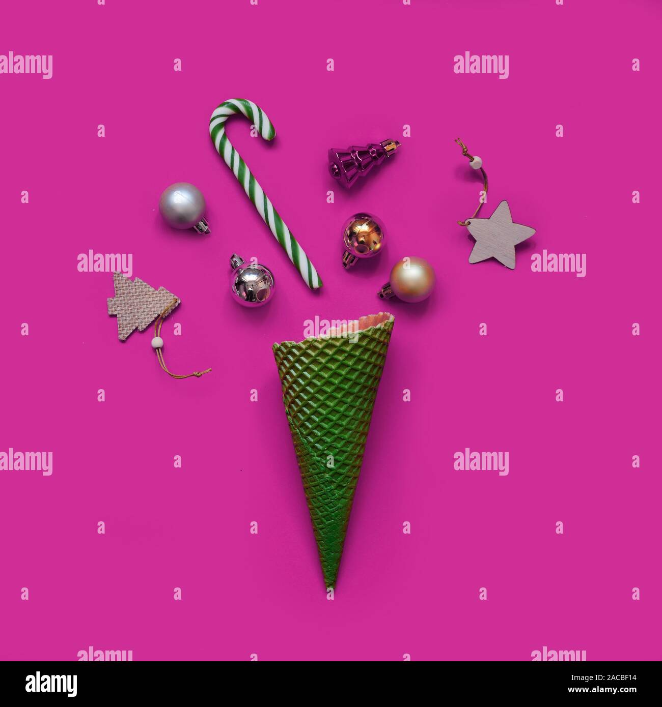 Ice Cream Cone with Christmas Decoration. Minimal Christmas Concept. Flat Lay Stock Photo