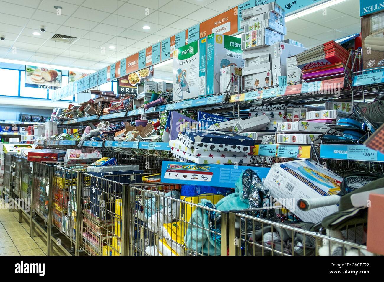Goods on display in an aisle in ALDI Supermarket in Newquay in Cornwall. Stock Photo