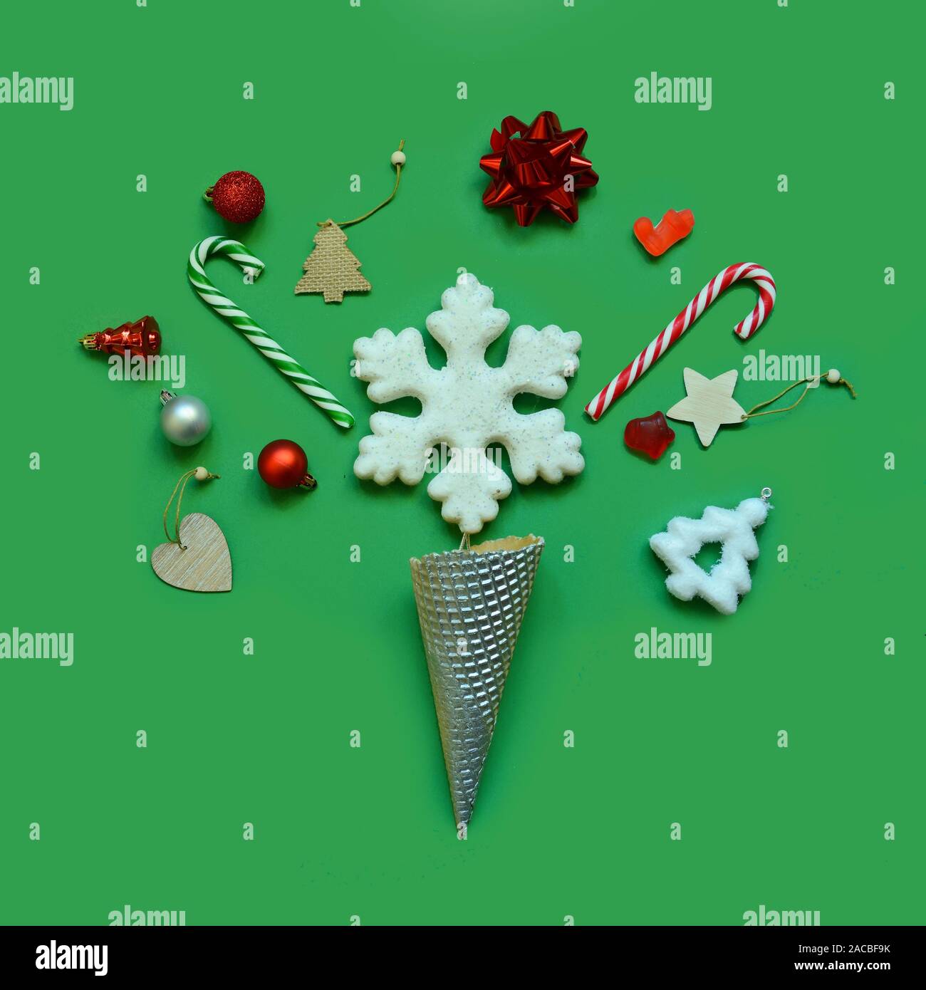 Trendy creative ice cream cone with various Christmas objects Stock Photo