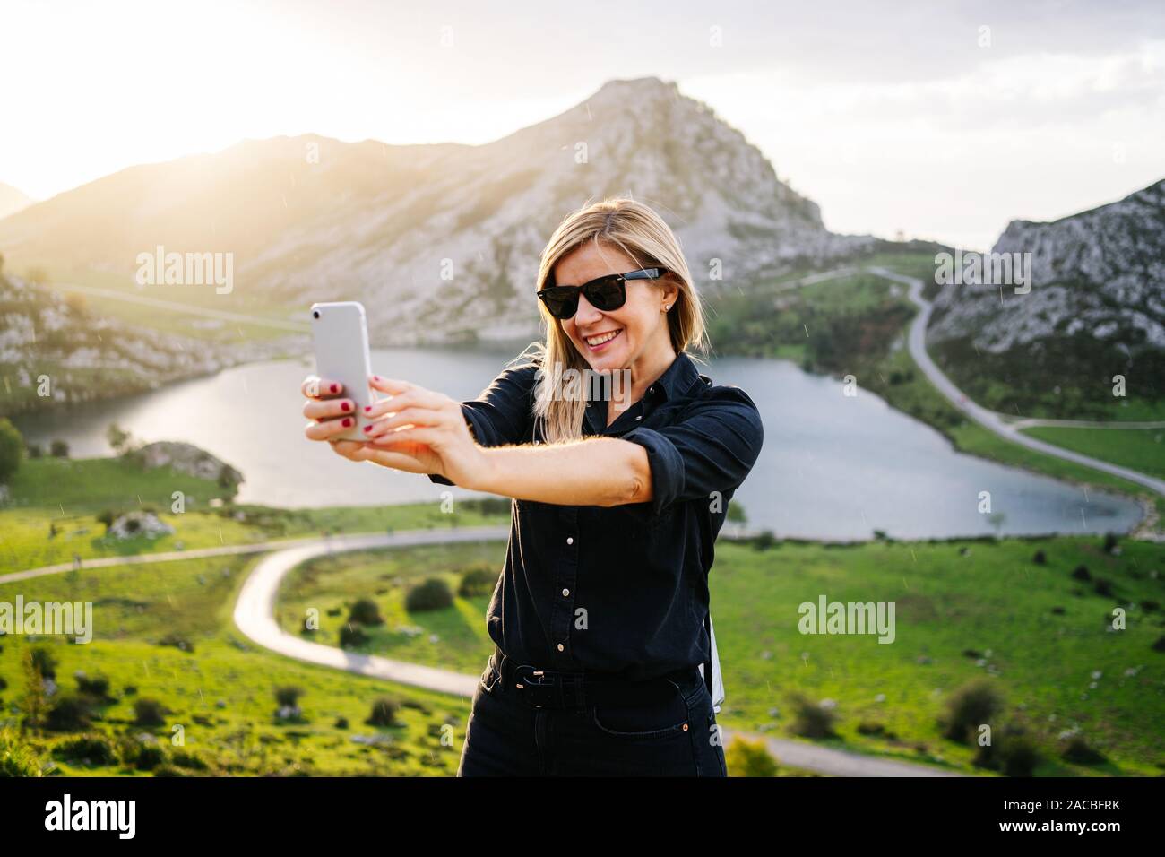 Beautiful blonde woman outdoors hi-res stock photography and images - Alamy