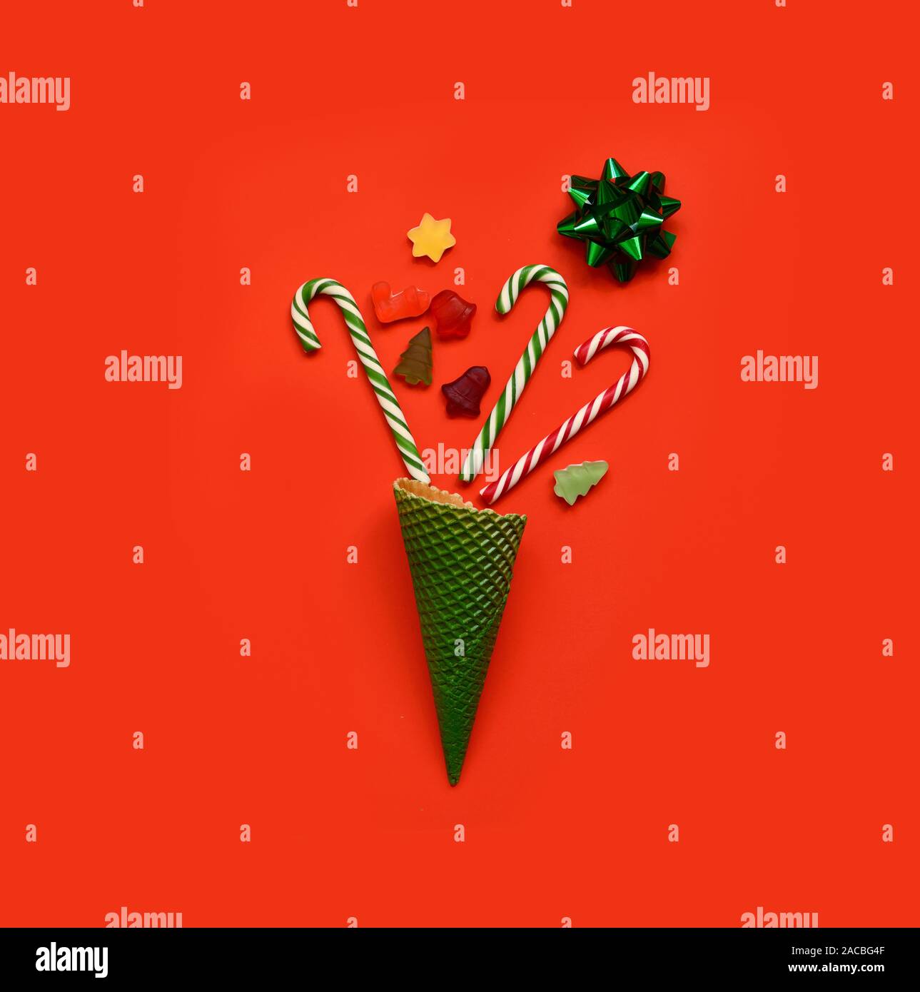 Ice Cream Cone with Christmas Decoration. Minimal Christmas Concept. Flat Lay Stock Photo