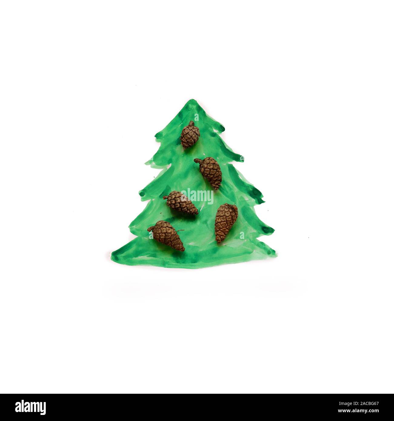 Painted Christmas tree with fir cones on white background Stock Photo