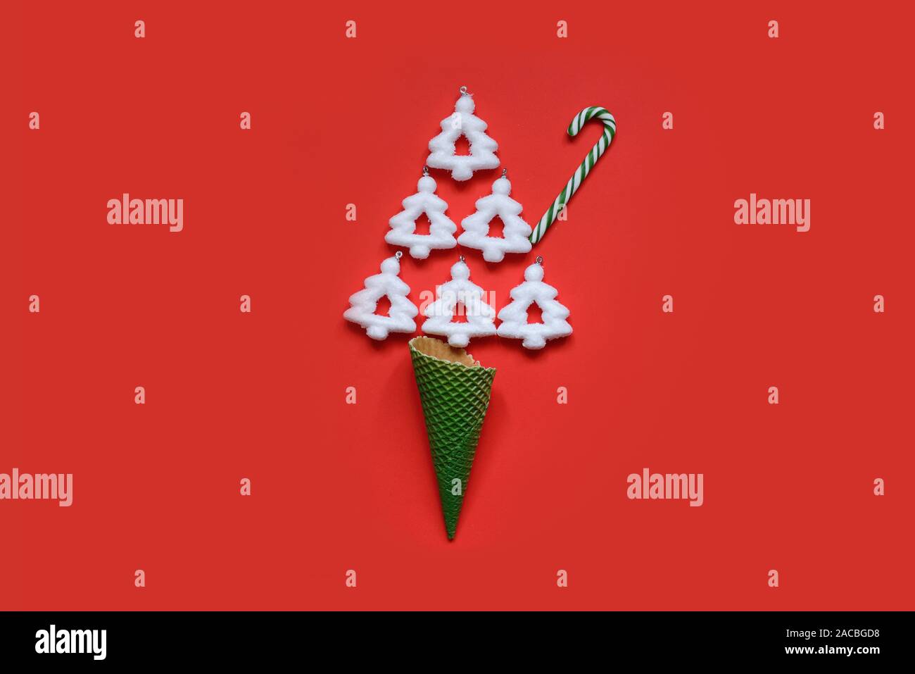 Ice Cream Cone with Christmas Decoration. Minimal Christmas Concept. Flat Lay Stock Photo