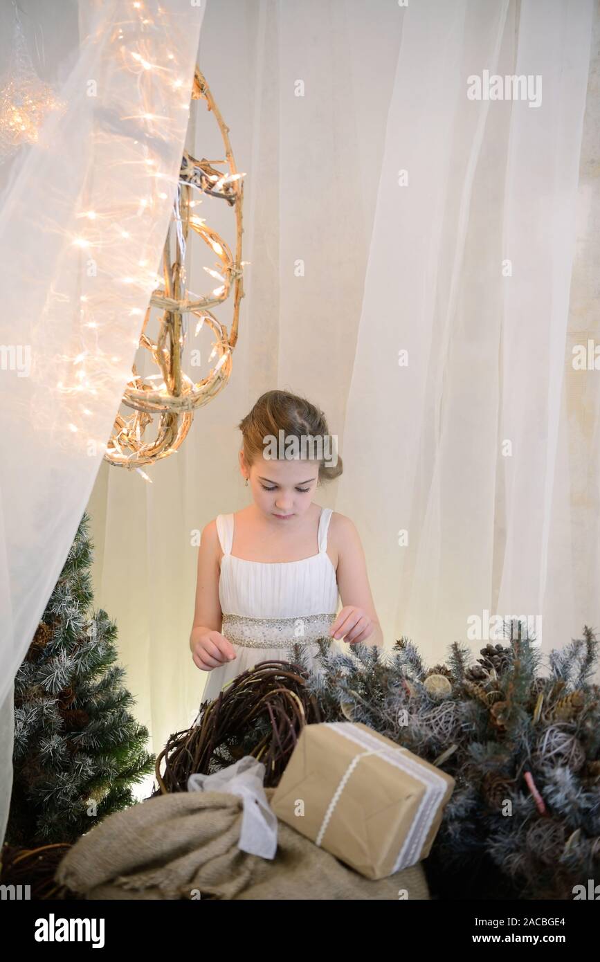 Girl child in beautiful Christmas decorated Stock Photo