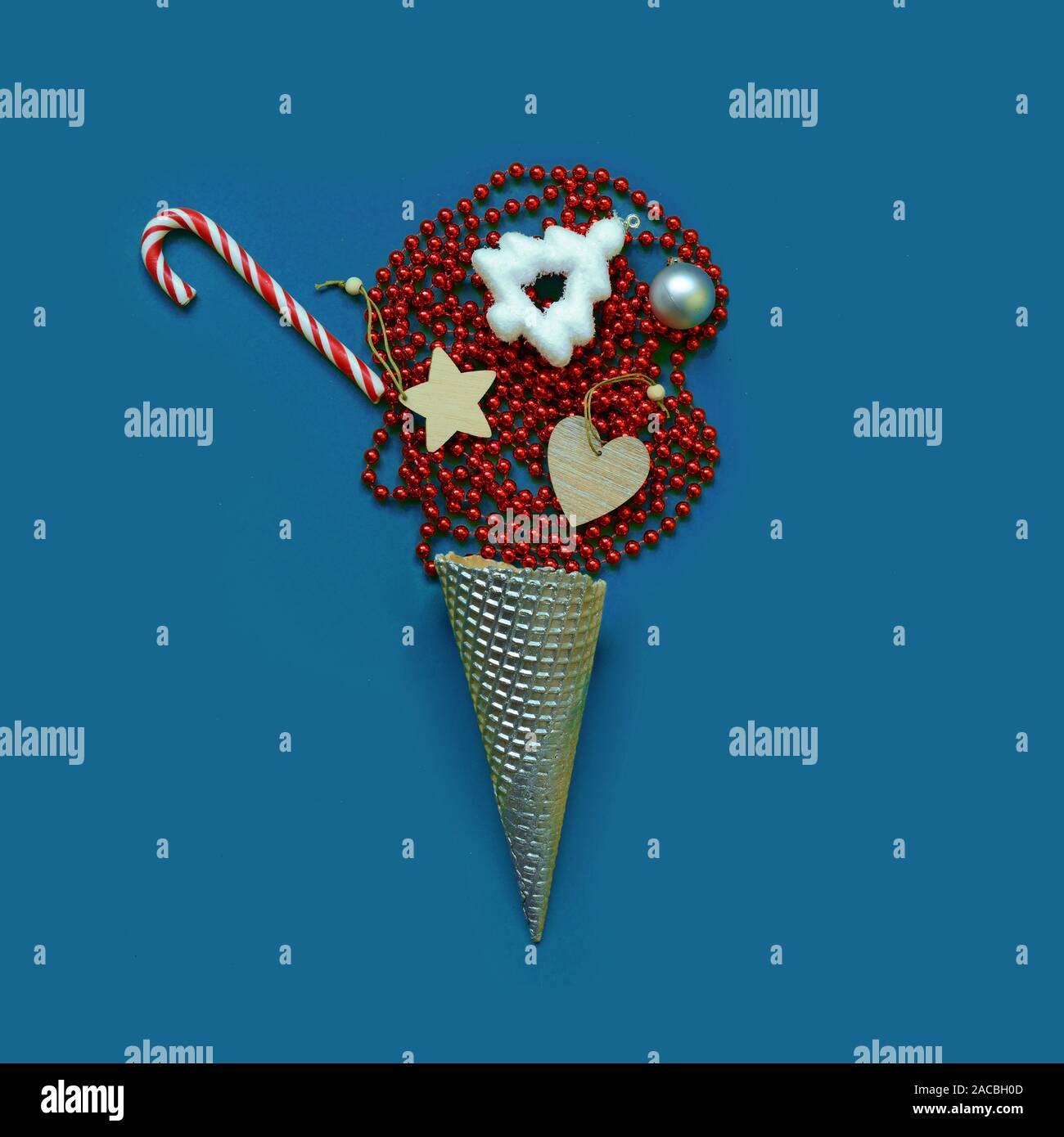 Trendy creative ice cream cone with various Christmas objects Stock Photo