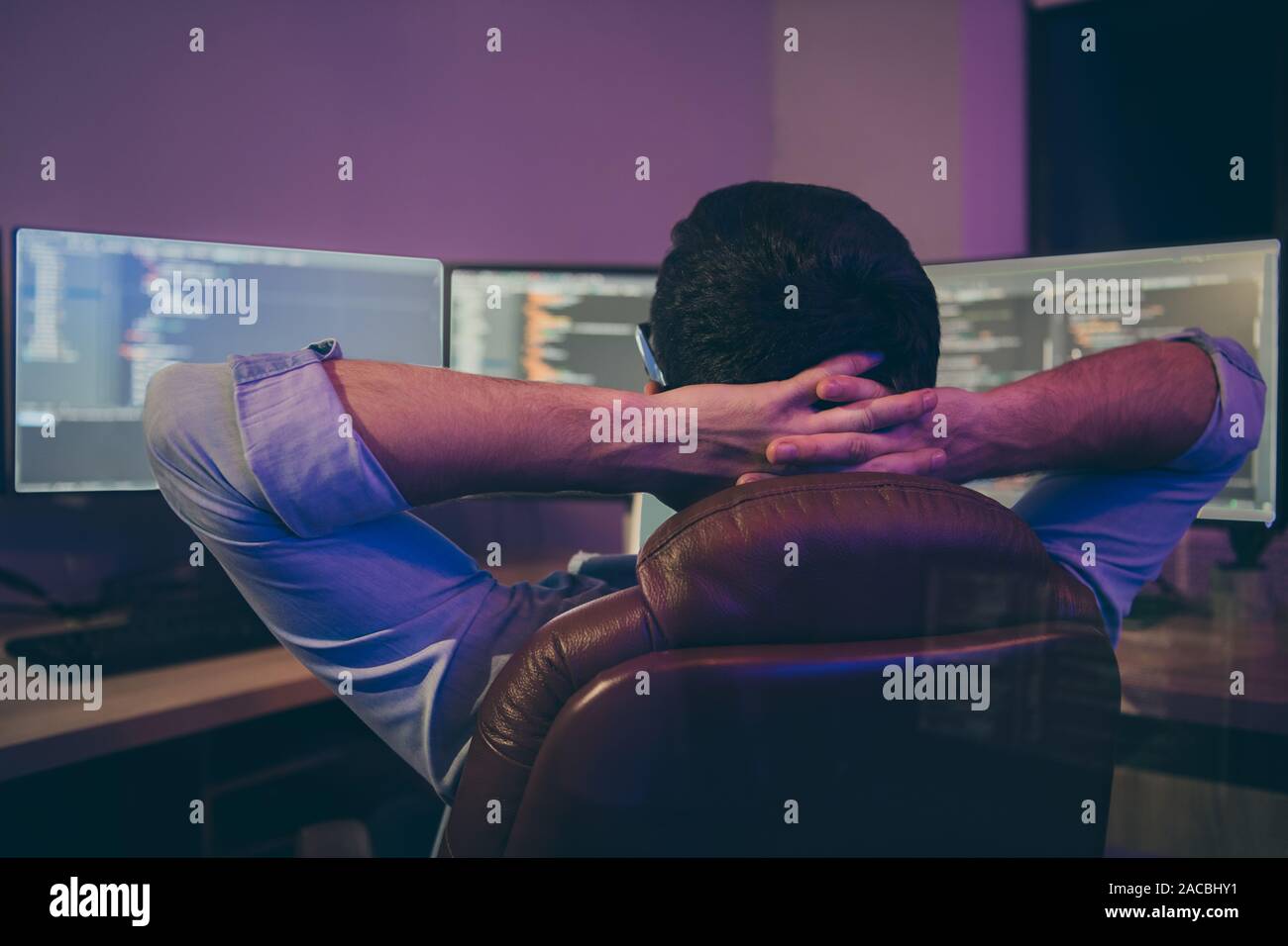 Close-up rear back behind view of nice skilled genius brunet guy geek ...