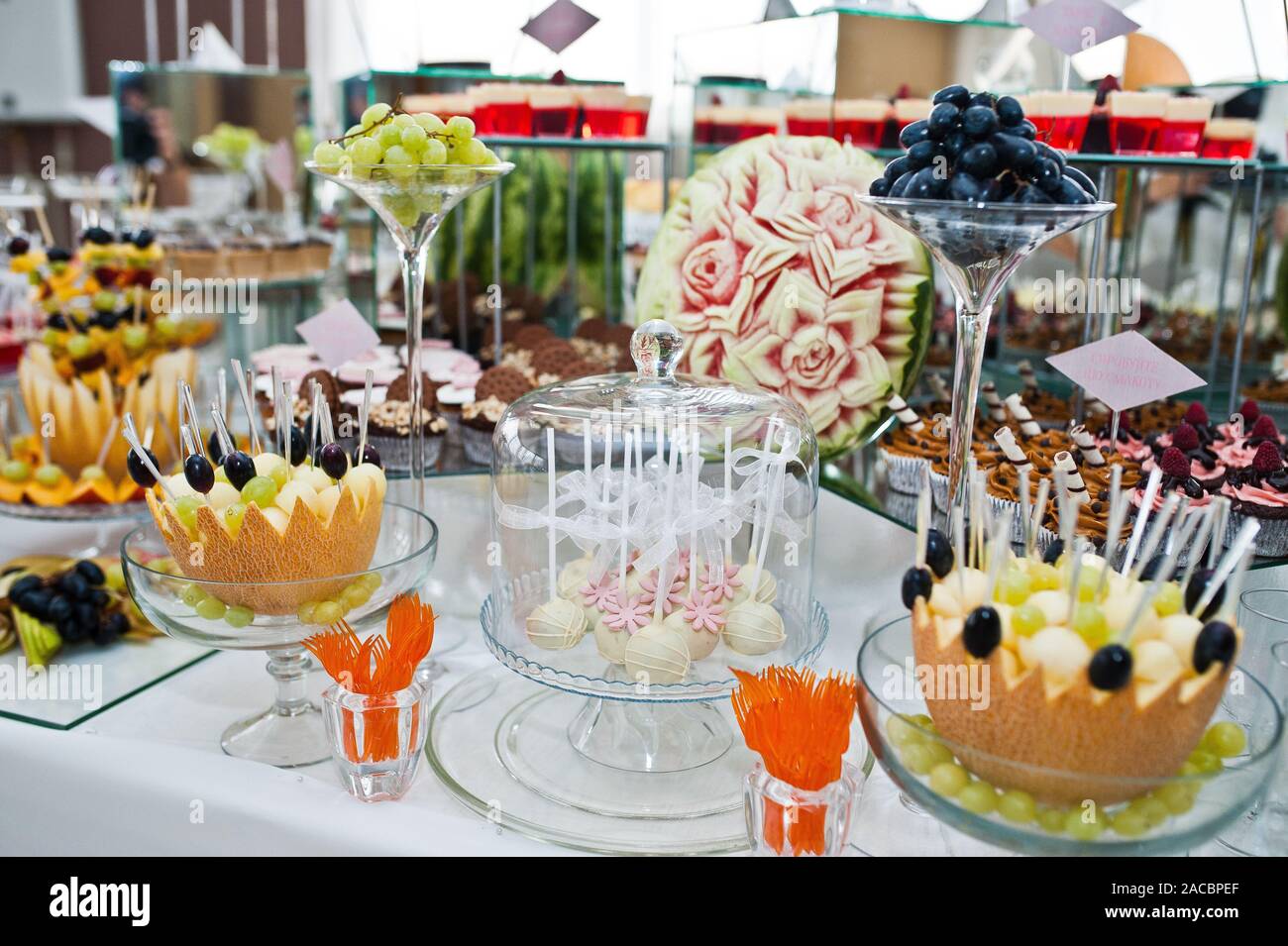 Dessert Table Of Delicious Sweets On Wedding Reception Stock Photo